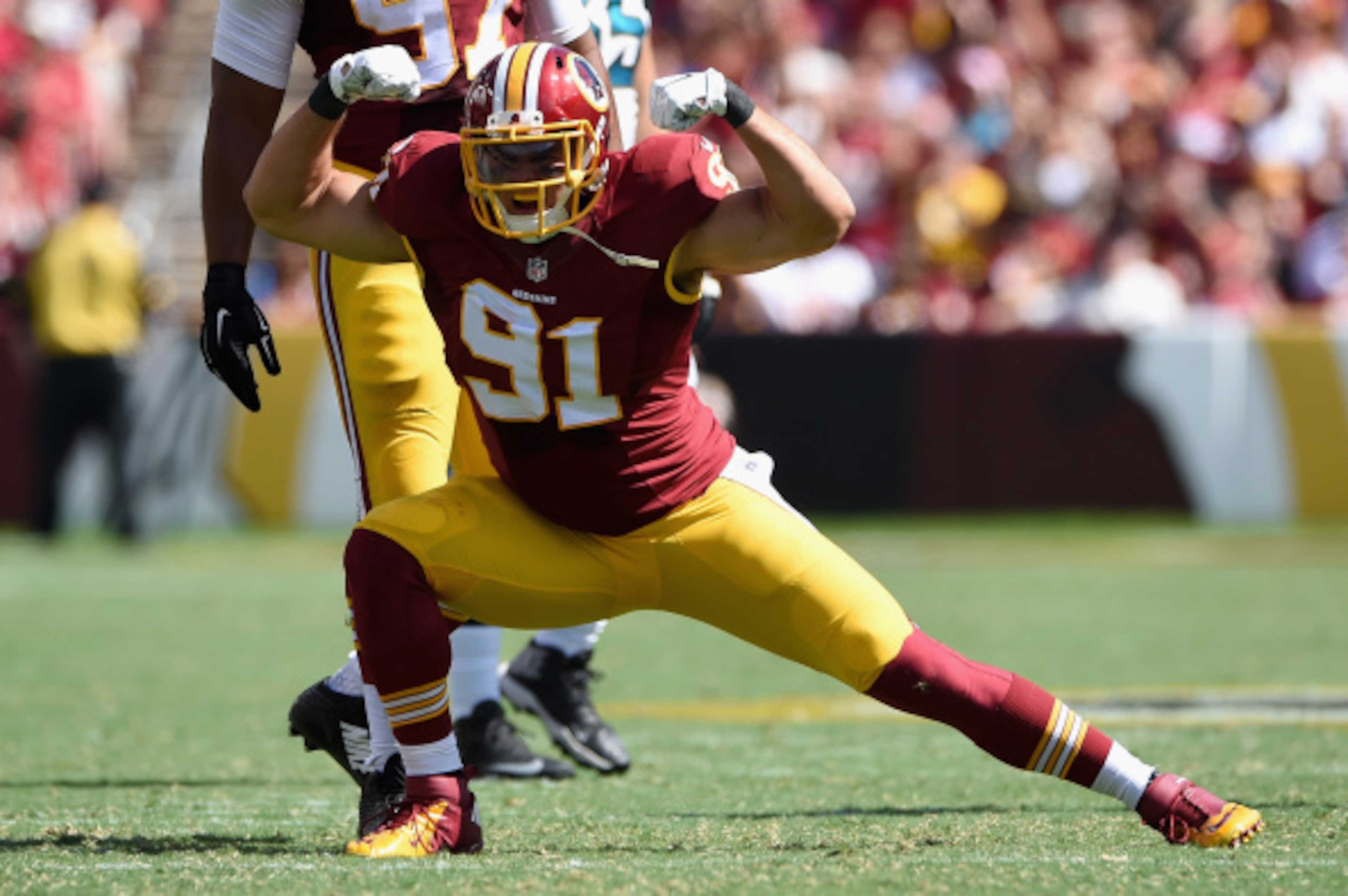 LANDOVER, MD - SEPTEMBER 14: Outside linebacker Ryan Kerrigan #91 of the Washington Redskins celebreates after recording a second quarter sack during a game against the Jacksonville Jaguars at FedExField on September 14, 2014 in Landover, Maryland.  (Phot