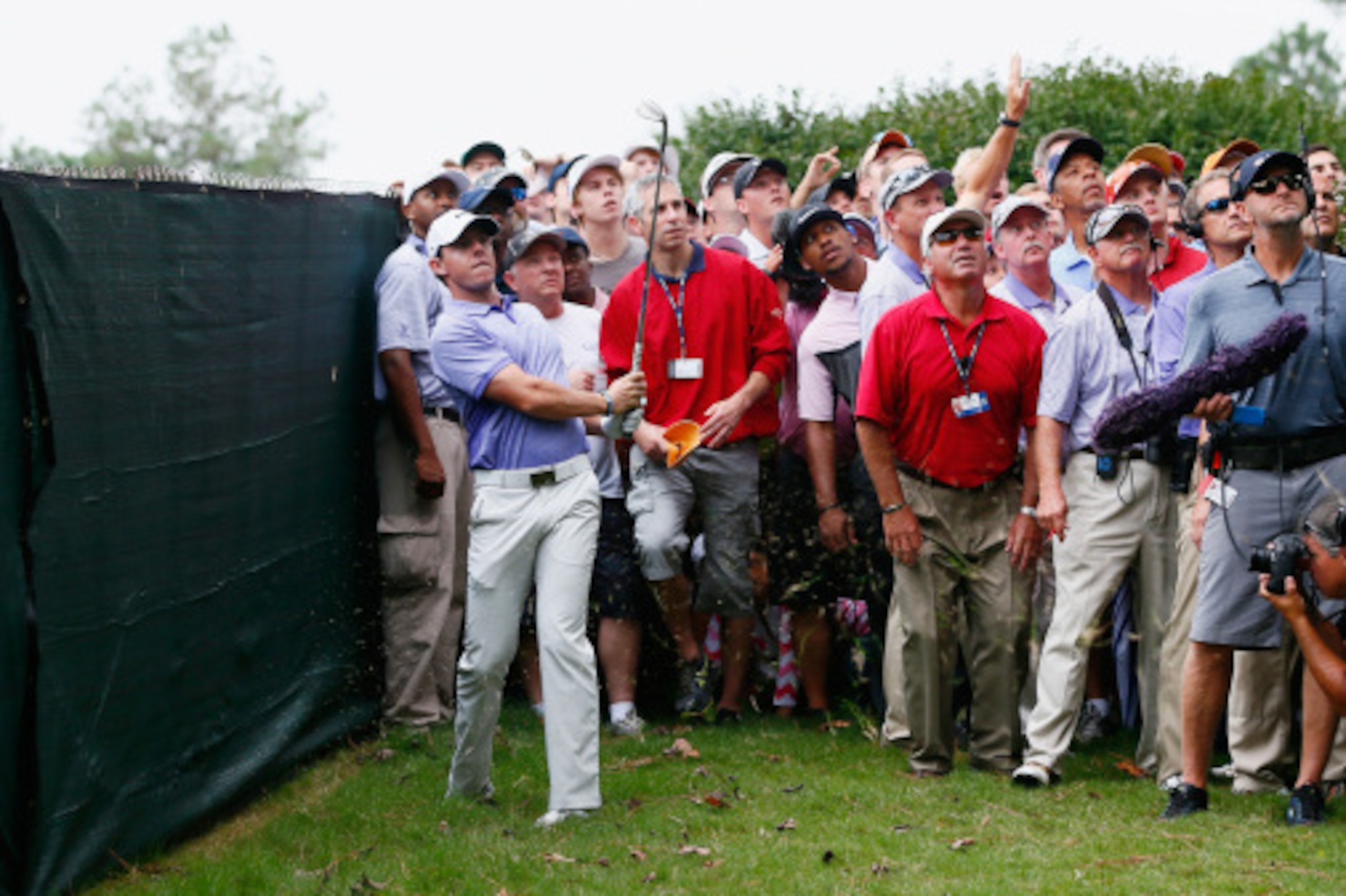 ATLANTA, GA - SEPTEMBER 14:  Rory McIlroy of Northern Ireland plays a shot from the rough on the ninth hole during the final round of the TOUR Championship by Coca-Cola at the East Lake Golf Club on September 14, 2014 in Atlanta, Georgia.  (Photo by Kevin