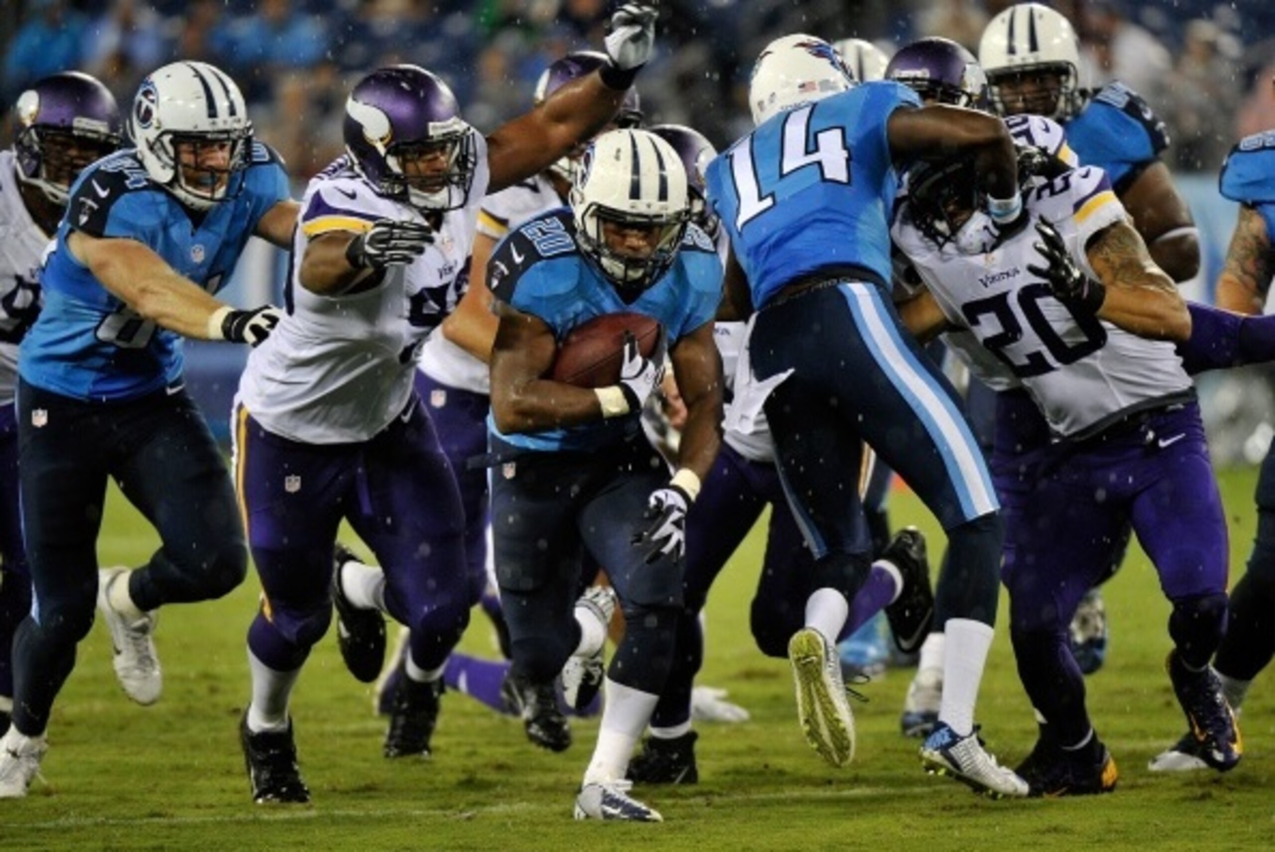 NASHVILLE, TN - AUGUST 28:  Running back Bishop Sankey #20 of the Tennessee Titans rushes against the Minnesota Vikings at LP Field on August 28, 2014 in Nashville, Tennessee.  (Photo by Frederick Breedon/Getty Images)