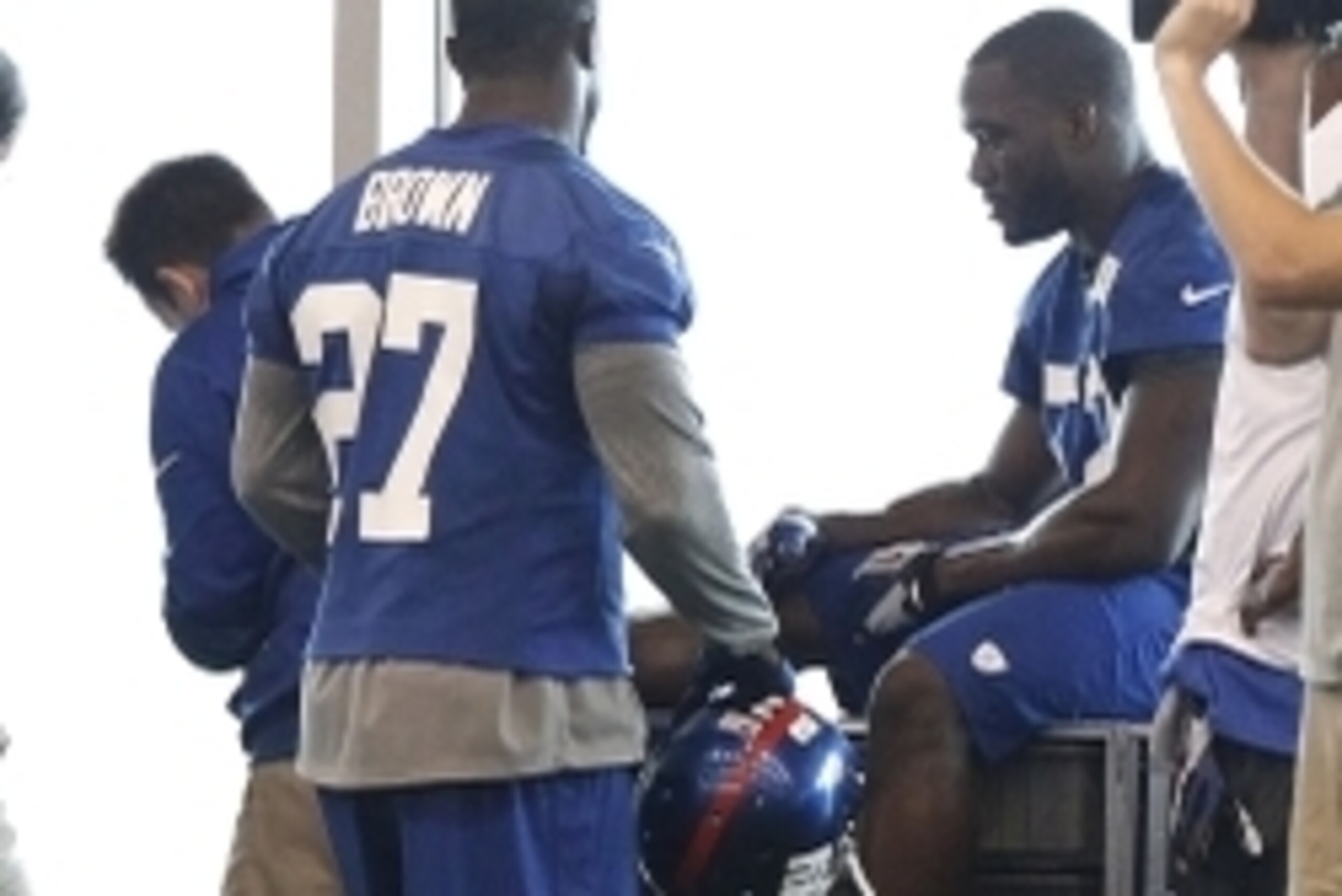 Jun 12, 2014; East Rutherford, NJ, USA; New York Giants outside linebacker Jon Beason (52) is tended to on the sidelines during New York Giants minicamp at the Quest Diagnostics Training Center. William Perlman/The Star-Ledger-USA TODAY Sports