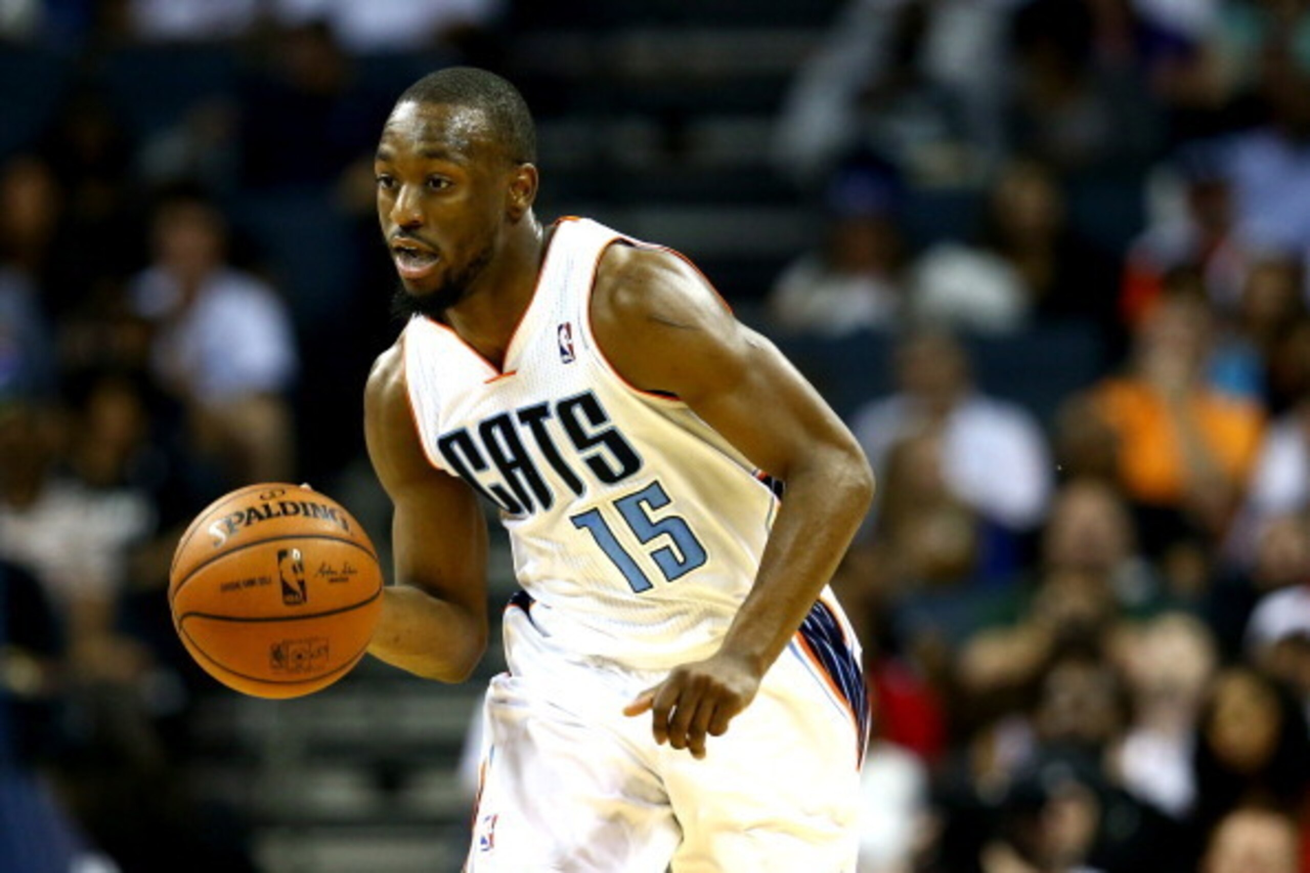 CHARLOTTE, NC - APRIL 28: Kemba Walker #15 of the Charlotte Bobcats against the Miami Heat in Game Four of the Eastern Conference Quarterfinals during the 2014 NBA Playoffs at Time Warner Cable Arena on April 28, 2014 in Charlotte, North Carolina. NOTE T CHARLOTTE, NC - APRIL 28: Kemba Walker #15 of the Charlotte Bobcats against the Miami Heat in Game Four of the Eastern Conference Quarterfinals during the 2014 NBA Playoffs at Time Warner Cable Arena on April 28, 2014 in Charlotte, North Carolina. NOTE T