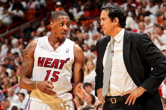 MIAMI, FL - MAY 6: Head Coach Erik Spoelstra of the Miami Heat speaks with Mario Chalmers #15 while playing the Chicago Bulls in Game One of the Eastern Conference Semifinals during the 2013 NBA Playoffs on May 6, 2013 at American Airlines Arena in Miami,