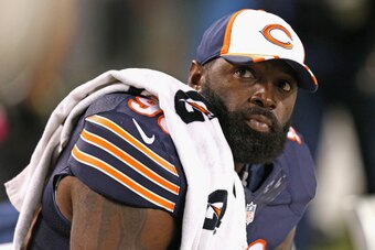 CHICAGO, IL - AUGUST 14:  Jeremiah Ratliff #90 of the Chicago Bears sits on the bench during a preseason game against the Jacksonville Jaguars at Soldier Field on August 14, 2014 in Chicago, Illinois.  The Bears defeated the Jaguars 20-19.  (Photo by Jona