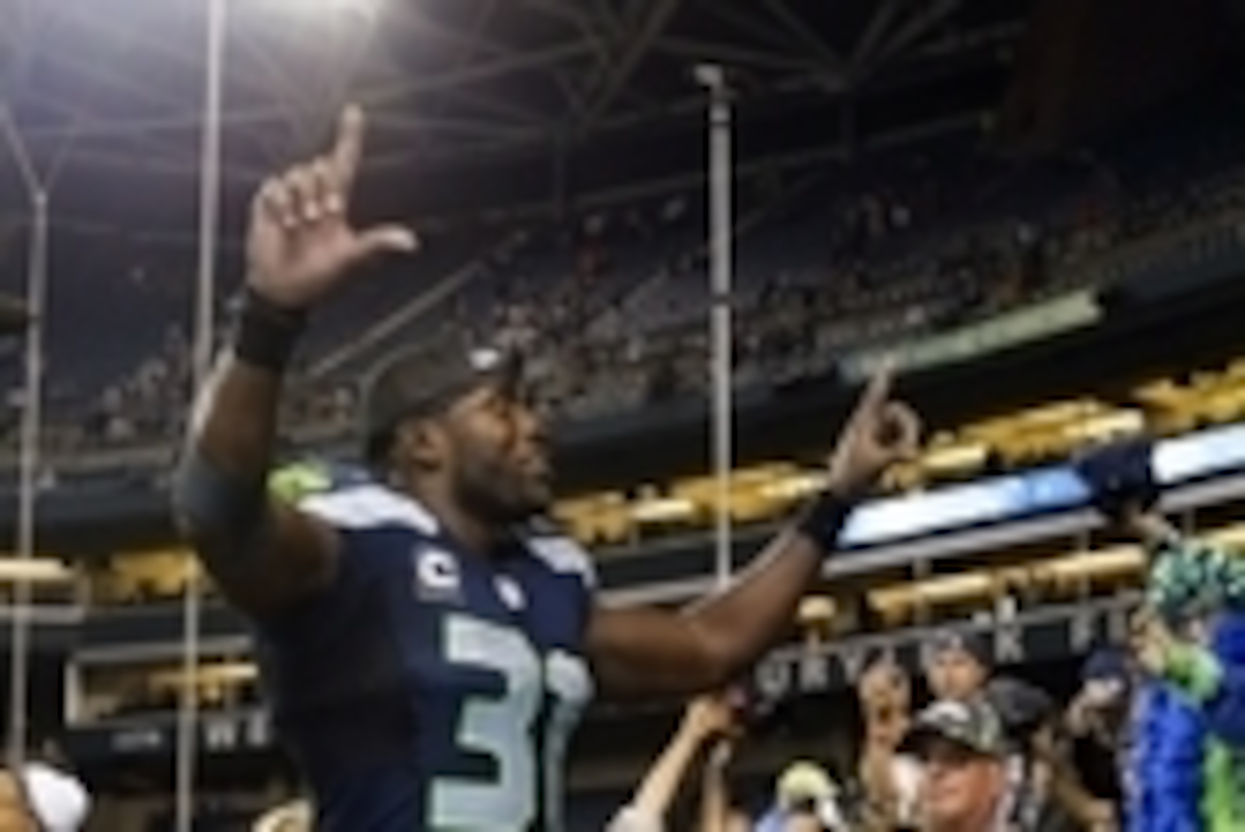 Sep 4, 2014; Seattle, WA, USA; Seattle Seahawks strong safety Kam Chancellor (31) walks off the field following a 36-16 Seahawks victory at CenturyLink Field. Mandatory Credit: Joe Nicholson-USA TODAY Sports