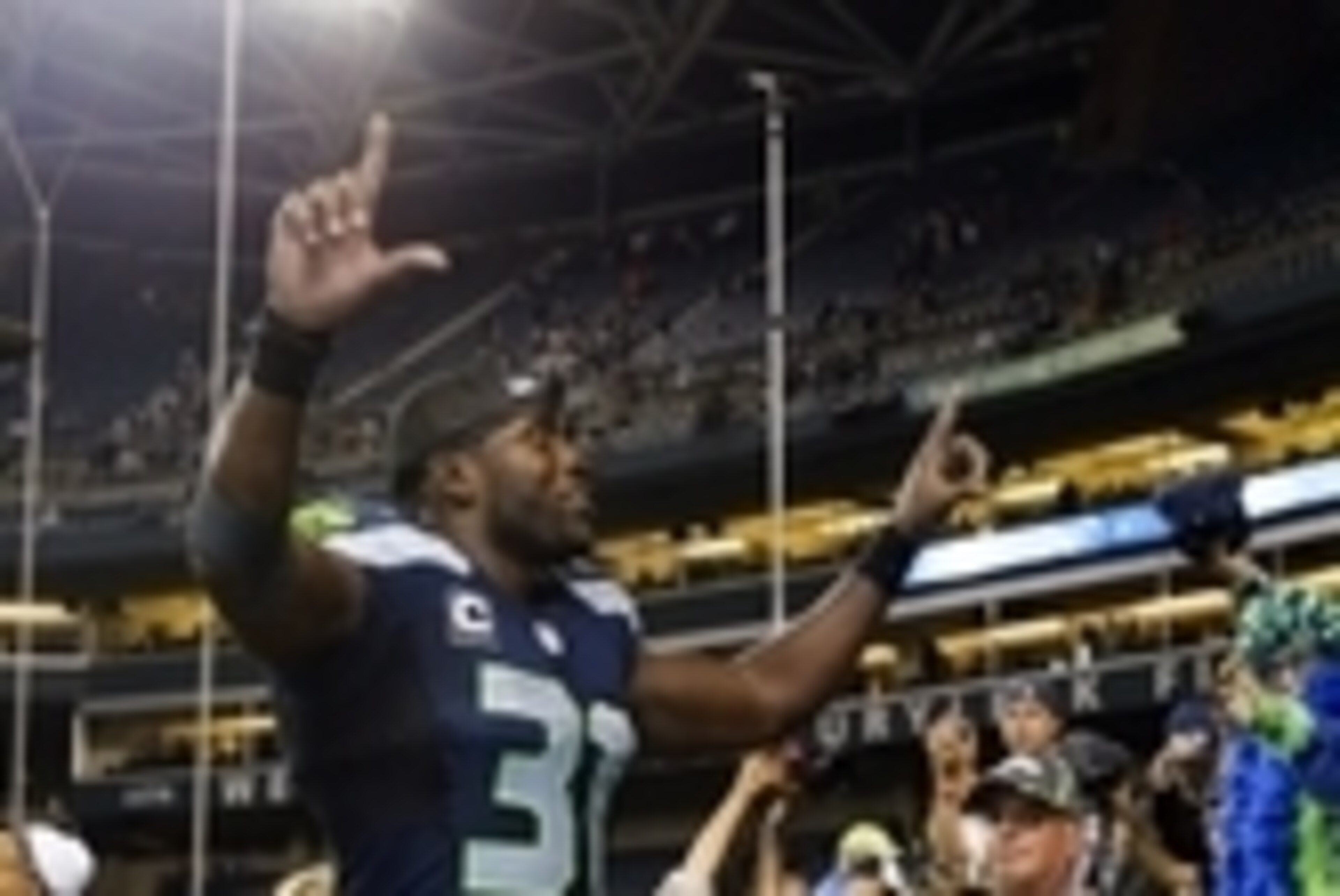 Sep 4, 2014; Seattle, WA, USA; Seattle Seahawks strong safety Kam Chancellor (31) walks off the field following a 36-16 Seahawks victory at CenturyLink Field. Mandatory Credit: Joe Nicholson-USA TODAY Sports