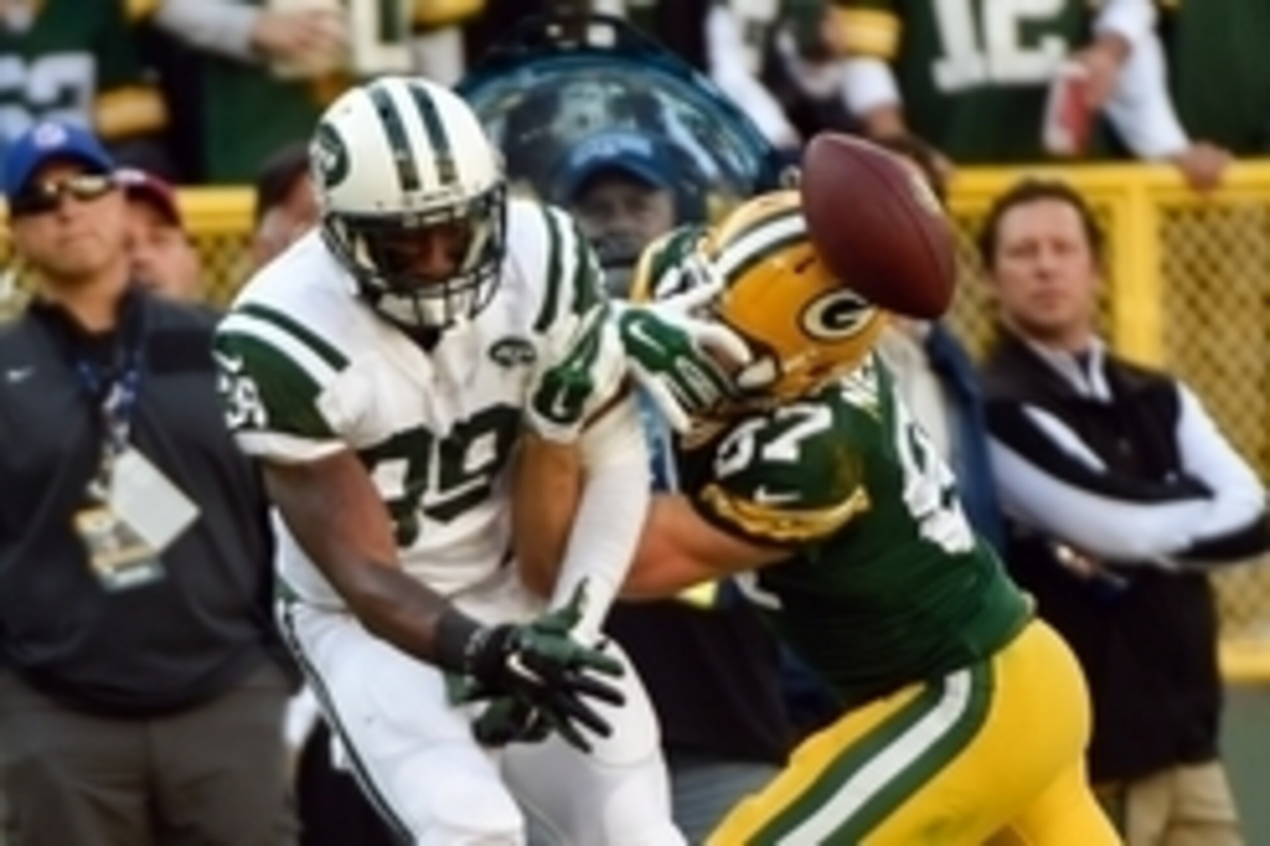 Sep 14, 2014; Green Bay, WI, USA;  New York Jets safety Antonio Allen (39) is called for pass interference against Green Bay Packers wide receiver Jordy Nelson (87) in the second quarter at Lambeau Field. Mandatory Credit: Benny Sieu-USA TODAY Sports