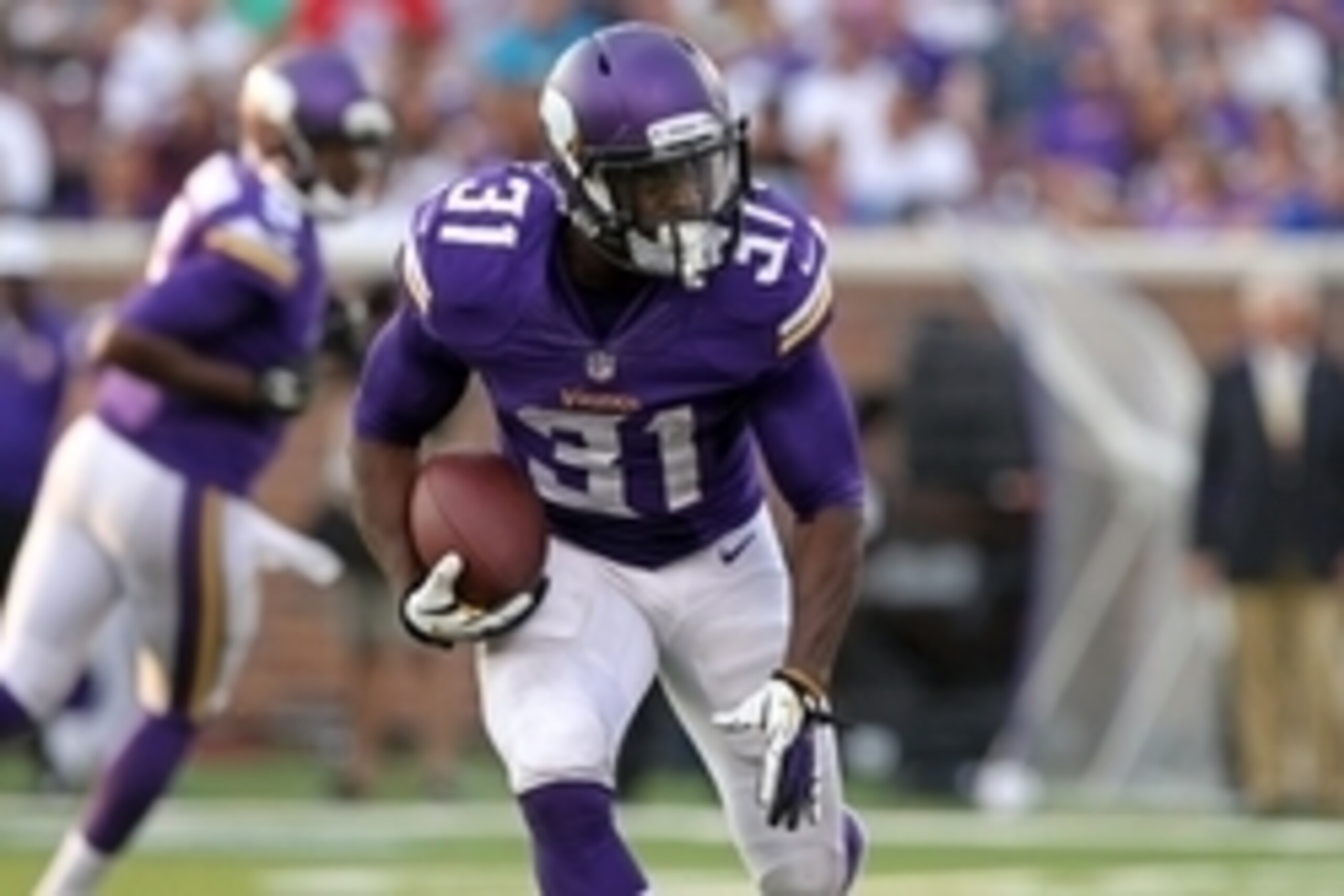 Aug 8, 2014; Minneapolis, MN, USA; Minnesota Vikings running back Jerick McKinnon (31) carries the ball during the second quarter against the Oakland Raiders at TCF Bank Stadium. Mandatory Credit: Brace Hemmelgarn-USA TODAY Sports