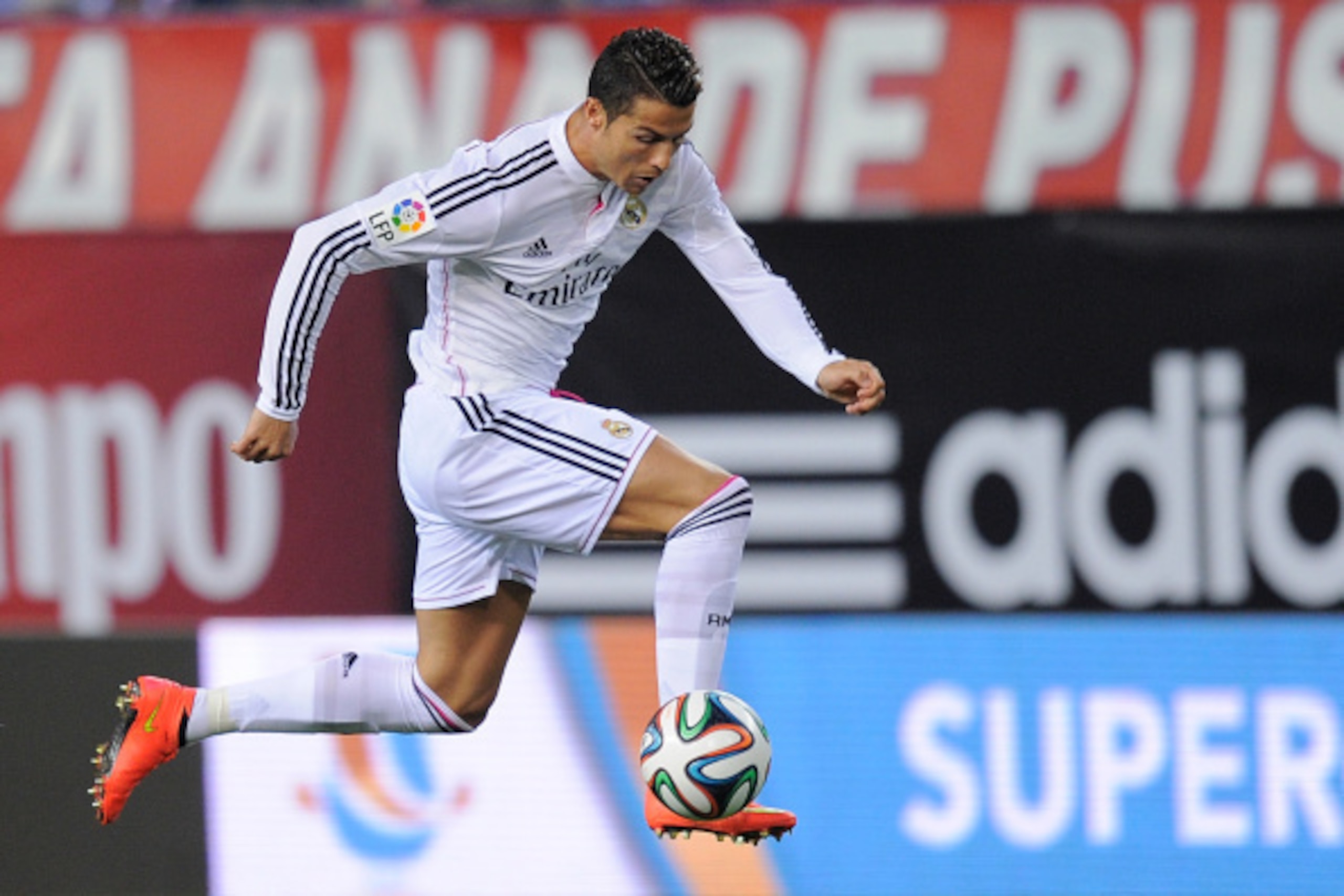 MADRID, SPAIN - AUGUST 22: Cristiano Ronaldo of Real Madrid in action during the Supercopa, second leg match between Club Atletico de Madrid and Real Madrid at Vicente Caldron stadium on August 22, 2014 in Madrid, Spain.  (Photo by Denis Doyle/Getty Image