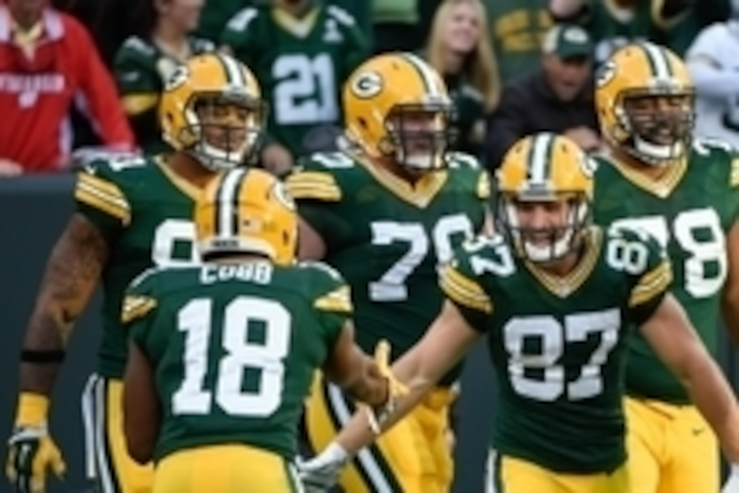 Sep 14, 2014; Green Bay, WI, USA;  Green Bay Packers wide receiver Jordy Nelson (87) celebrates with teammates after catching an 80-yard touchdown pass in the third quarter against the New York Jets at Lambeau Field. Mandatory Credit: Benny Sieu-USA TODAY