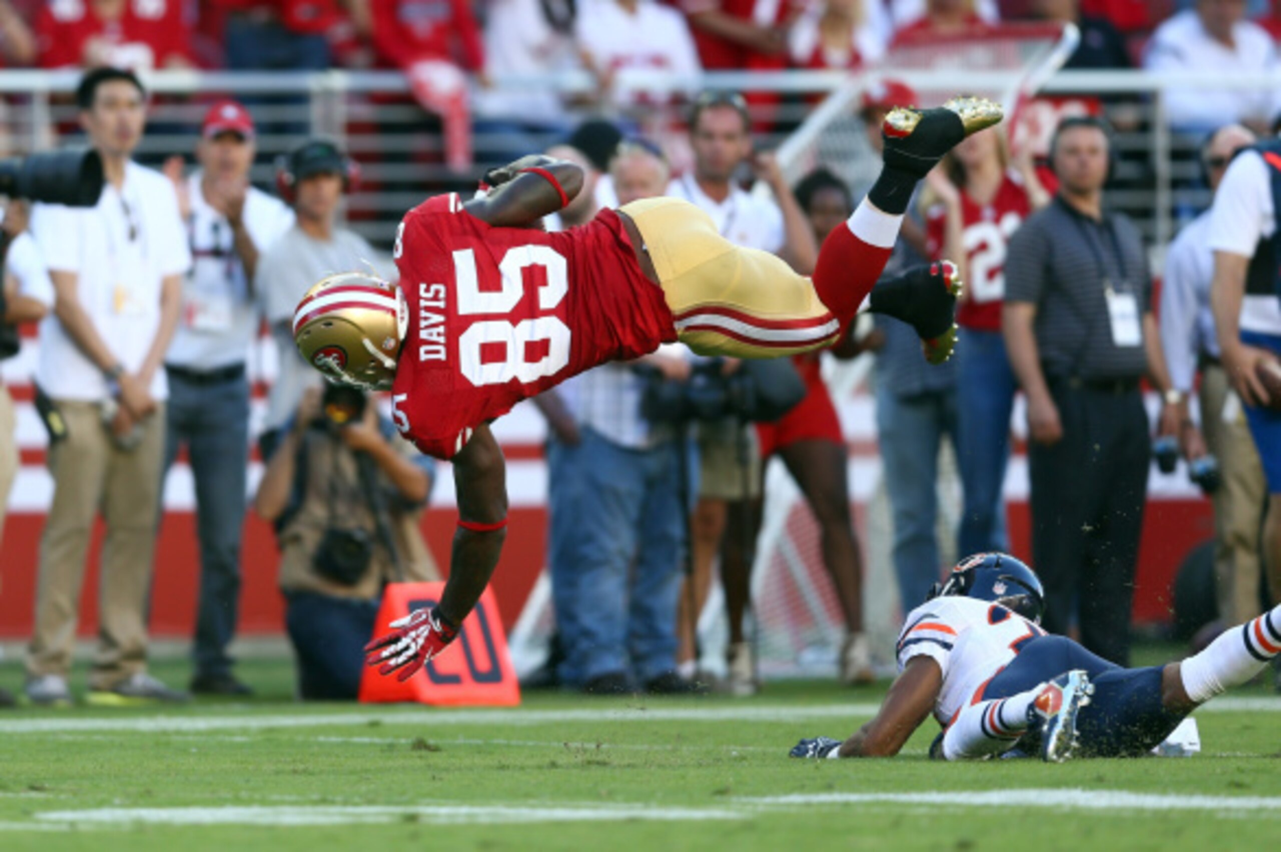 SANTA CLARA, CA - SEPTEMBER 14: Tight end Vernon Davis #85 of the San Francisco 49ers gets hit by cornerback Kyle Fuller #23 of the Chicago Bears during the second quarter of their game at Levi's Stadium on September 14, 2014 in Santa Clara, California. ( SANTA CLARA, CA - SEPTEMBER 14: Tight end Vernon Davis #85 of the San Francisco 49ers gets hit by cornerback Kyle Fuller #23 of the Chicago Bears during the second quarter of their game at Levi's Stadium on September 14, 2014 in Santa Clara, California. (