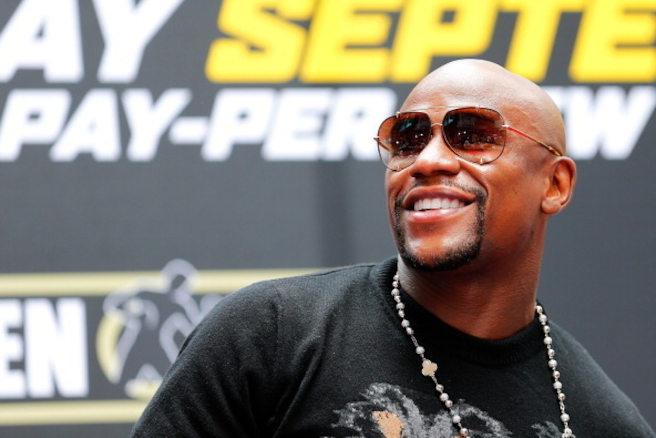NEW YORK, NY - JULY 14:  Floyd Mayweather Jr. ilooks on during a news conference at the Pedestrian Walk in Times Square on July 14, 2014 in New York City. Floyd Mayweather Jr. and Marcos Maidana are scheduled to fight September 13, 2014 at the MGM Grand i