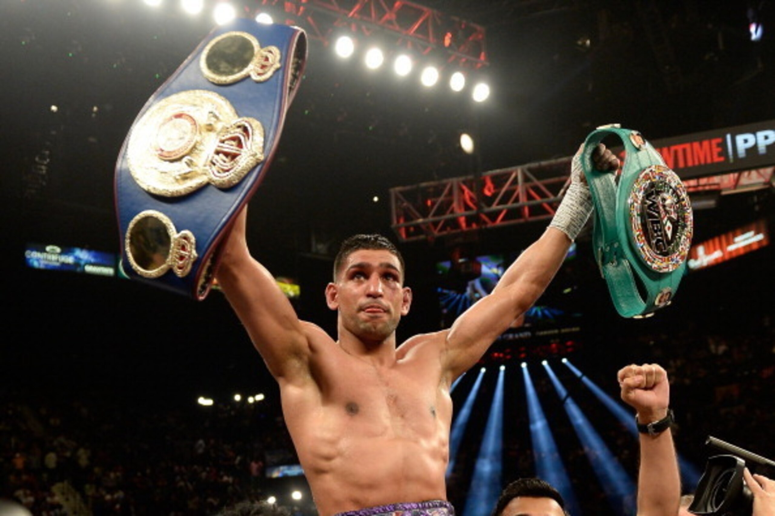 LAS VEGAS, NV - MAY 03:  Amir Khan celebrates his unanimous-decision victory against Luis Collazo after their welterweight bout at the MGM Grand Garden Arena on May 3, 2014 in Las Vegas, Nevada.  (Photo by Harry How/Getty Images)