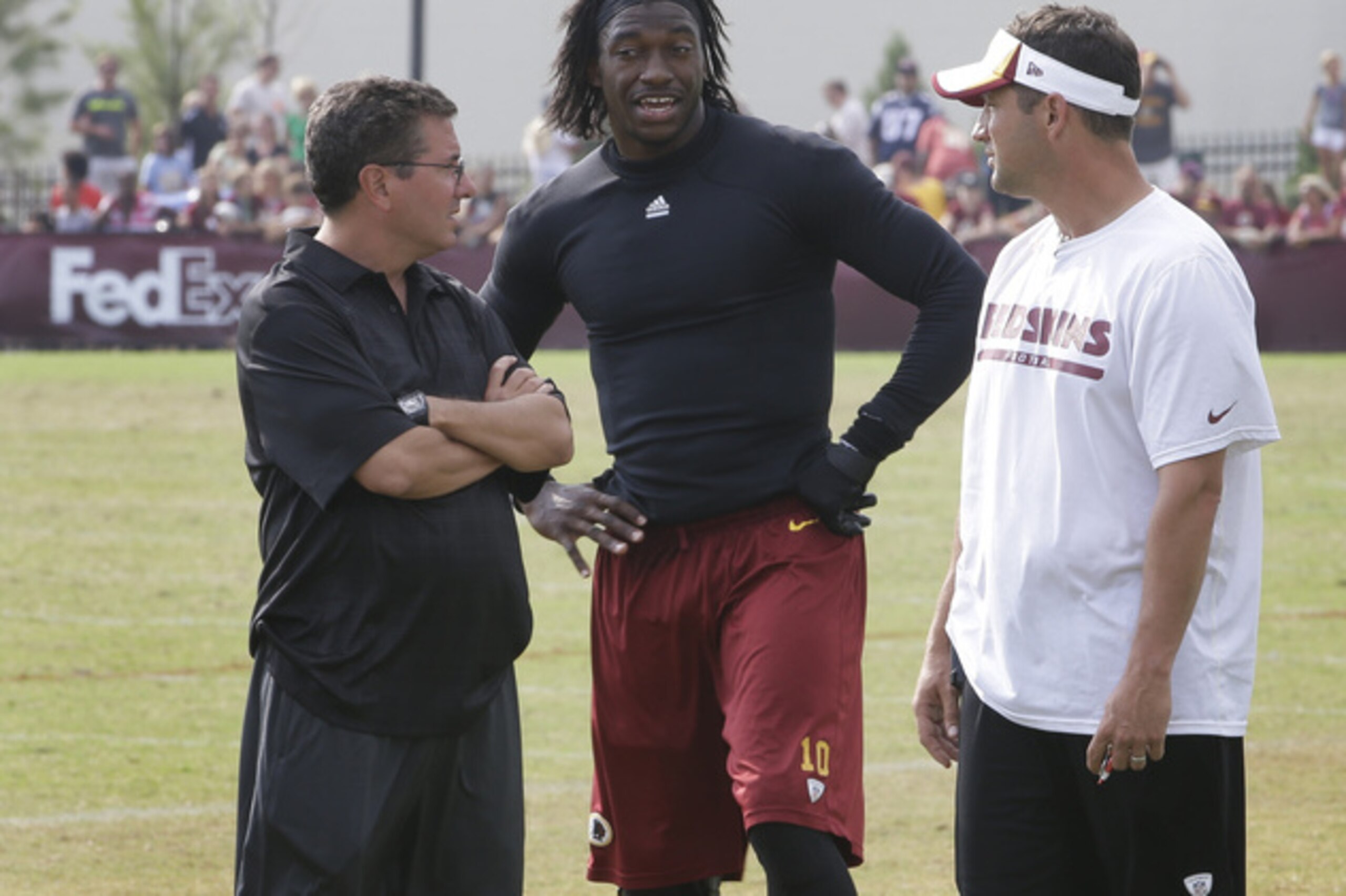 Owner Dan Snyder (L) won't want to give up on Griffin.