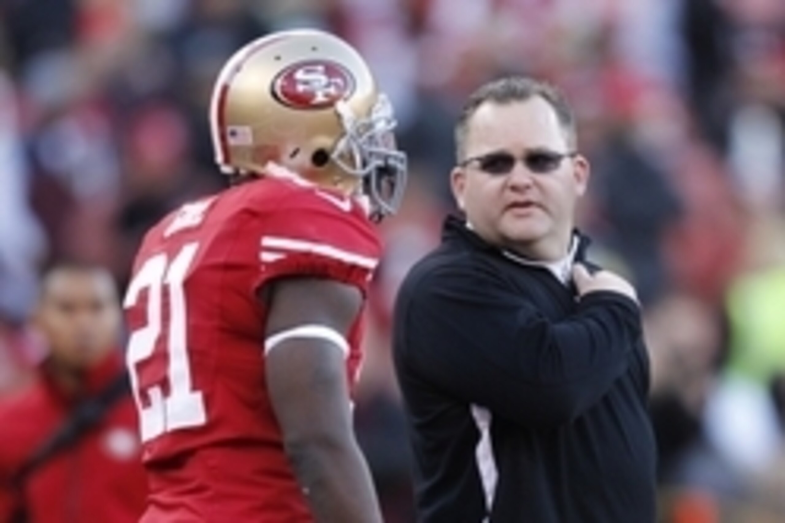 Jan 12, 2013; San Francisco, CA, USA; San Francisco 49ers offensive coordinator Greg Roman (right) talks to running back Frank Gore (21) before the NFC divisional round playoff game against the Green Bay Packers at Candlestick Park. Mandatory Credit: Car Jan 12, 2013; San Francisco, CA, USA; San Francisco 49ers offensive coordinator Greg Roman (right) talks to running back Frank Gore (21) before the NFC divisional round playoff game against the Green Bay Packers at Candlestick Park. Mandatory Credit: Car