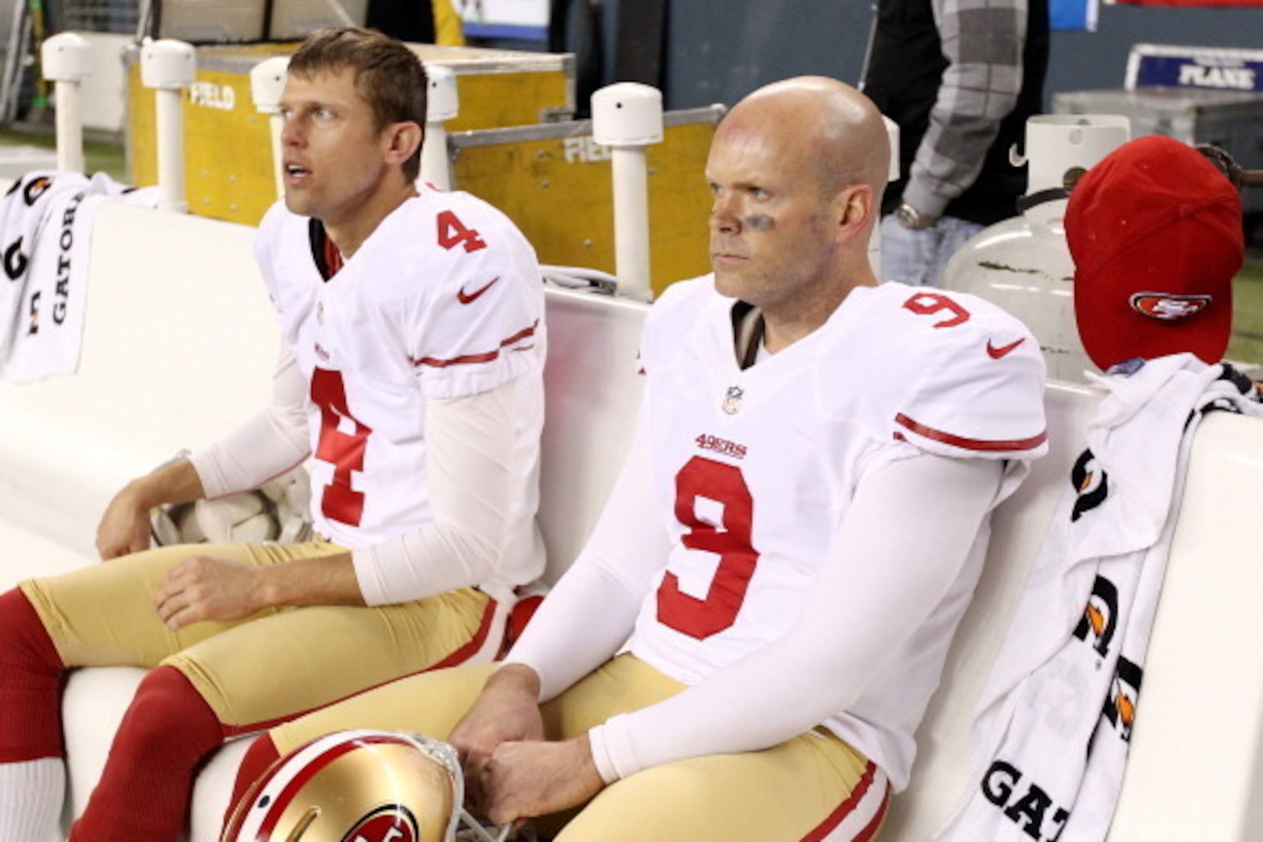 SEATTLE, WA - JANUARY 19: Kicker Phil Dawson #9 and punter Andy Lee #4 of the San Francisco 49ers sit on the bench during the 2014 NFC Championship against the Seattle Seahawks at CenturyLink Field on January 19, 2014 in Seattle, Washington. (Photo by Ch SEATTLE, WA - JANUARY 19: Kicker Phil Dawson #9 and punter Andy Lee #4 of the San Francisco 49ers sit on the bench during the 2014 NFC Championship against the Seattle Seahawks at CenturyLink Field on January 19, 2014 in Seattle, Washington. (Photo by Ch