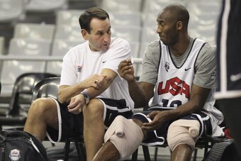 BARCELONA, SPAIN - JULY 23: Kobe Bryant #10 and Mike Krzyzewski Head Coach of the US Men's Senior National team are talking during practice at Palau Sant Jordi Arena on July 23, 2012 in Barcelona, Spain. NOTE TO USER: User expressly acknowledges and agree