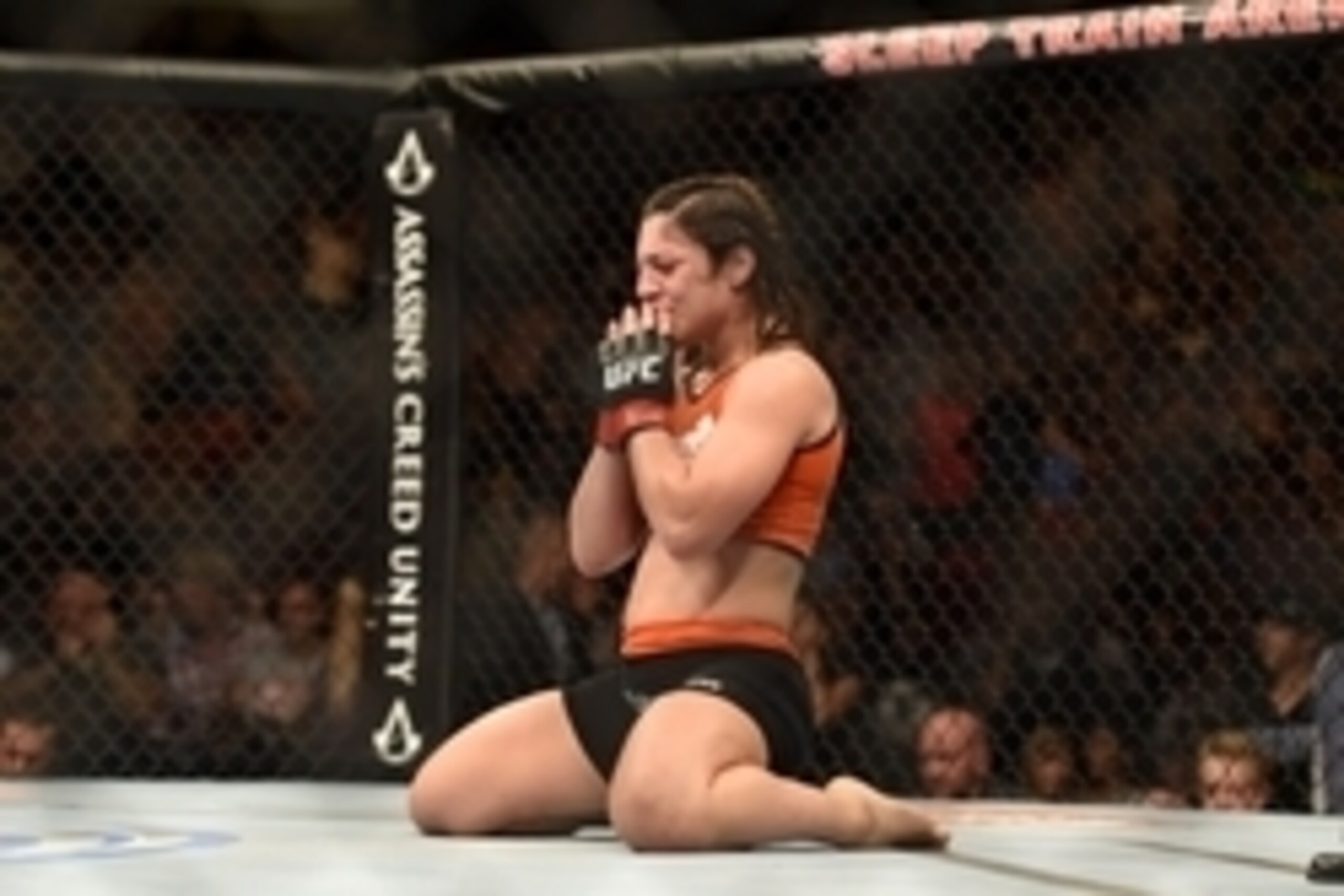 August 30, 2014; Sacramento, CA, USA; Bethe Correia (red gloves) defeats Shayna Baszler (blue gloves) during the women   s bantamweight bout of UFC 177 at Sleep Train Arena. Mandatory Credit: Kyle Terada-USA TODAY Sports