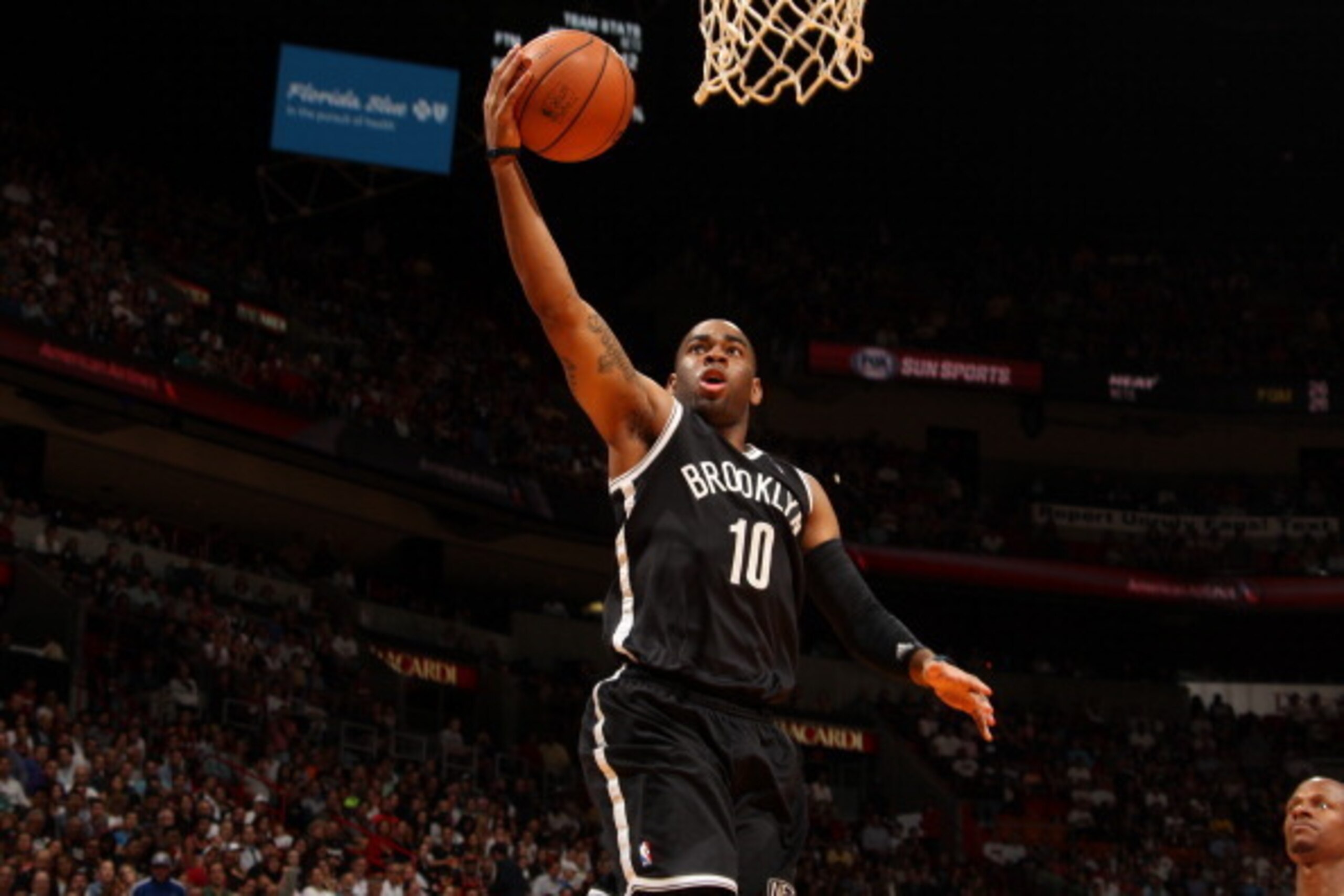 MIAMI, FL - March 12: Marcus Thornton #10 of the Brooklyn Nets goes to the basket against the Miami Heat at the American Airlines Arena in Miami, Florida on March 12 2014. NOTE TO USER: User expressly acknowledges and agrees that, by downloading and/or us
