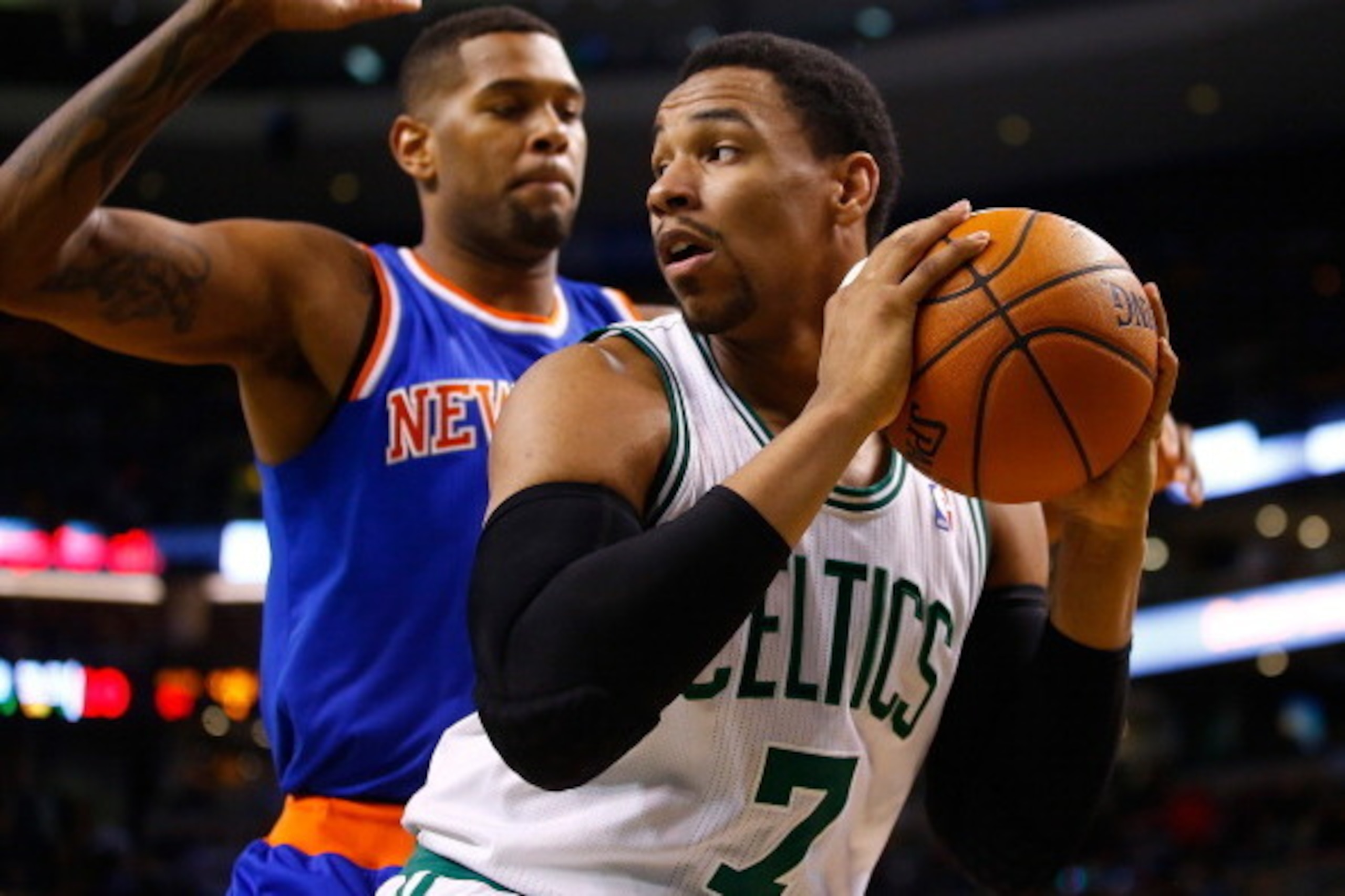 BOSTON, MA - MARCH 12: Jared Sullinger #7 of the Boston Celtics is defended by Jeremy Tyler #4 of the New York Knicks in the second half during the game at TD Garden on March 12, 2014 in Boston, Massachusetts. NOTE TO USER: User expressly acknowledges and