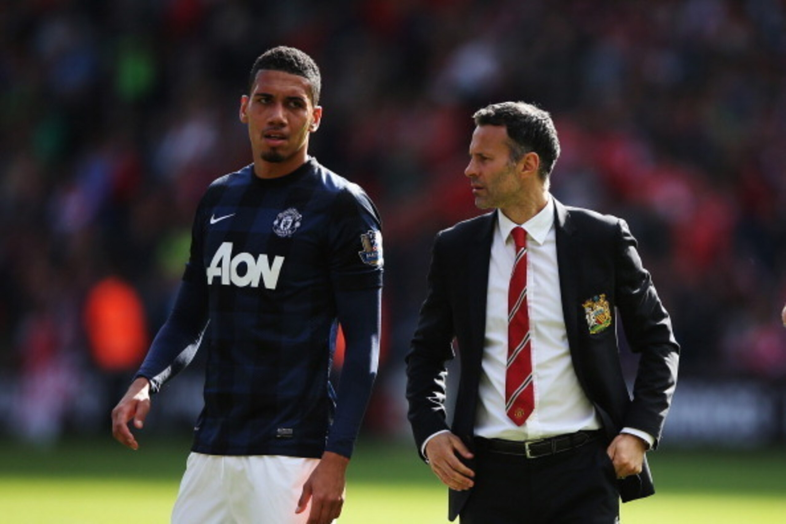 SOUTHAMPTON, ENGLAND - MAY 11:  Manchester United interim manager Ryan Giggs and player Chris Smalling react at the end of the Barclays Premier League match between Southampton and Manchester United at St Mary's Stadium on May 11, 2014 in Southampton, Eng