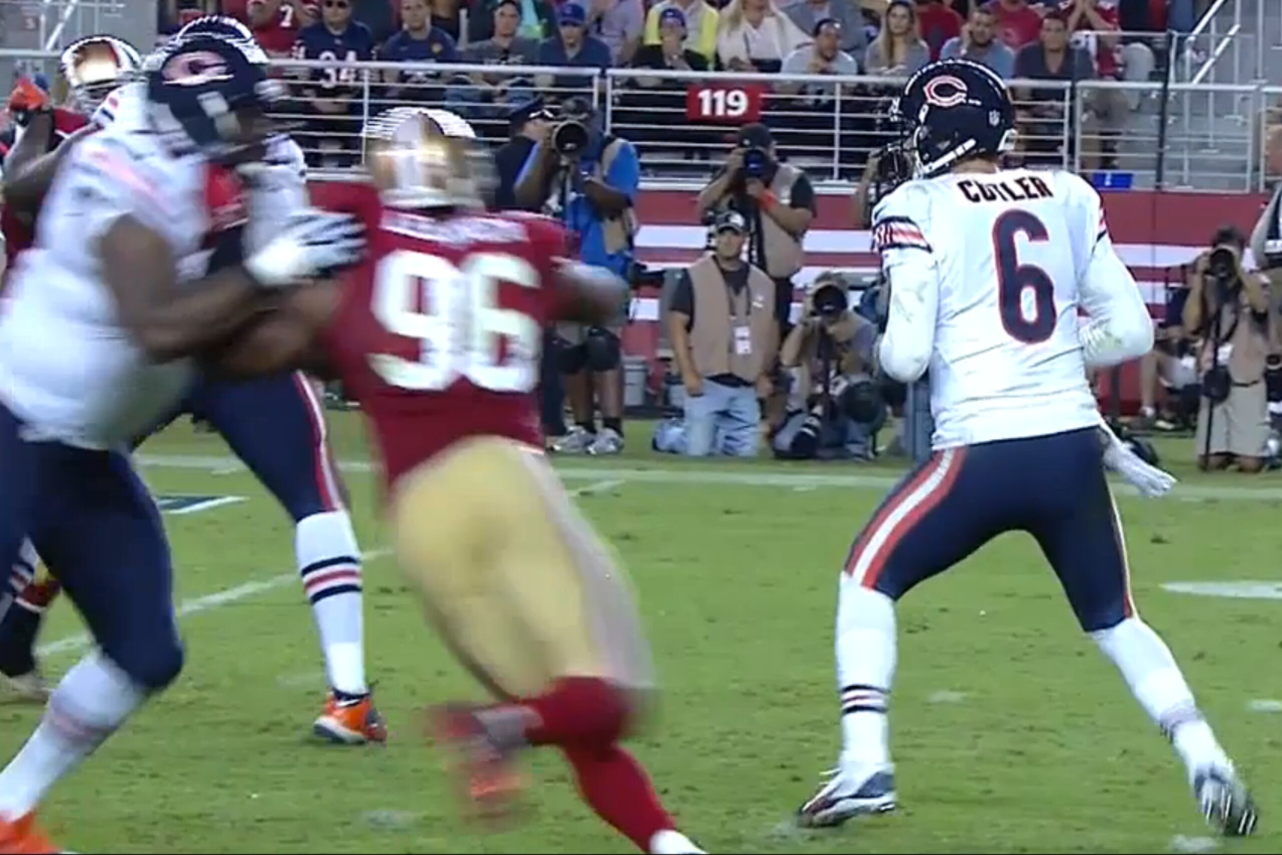 Corey Lemonier's left hand appears to be holding the bottom of Jermon Bushrod's facemask.