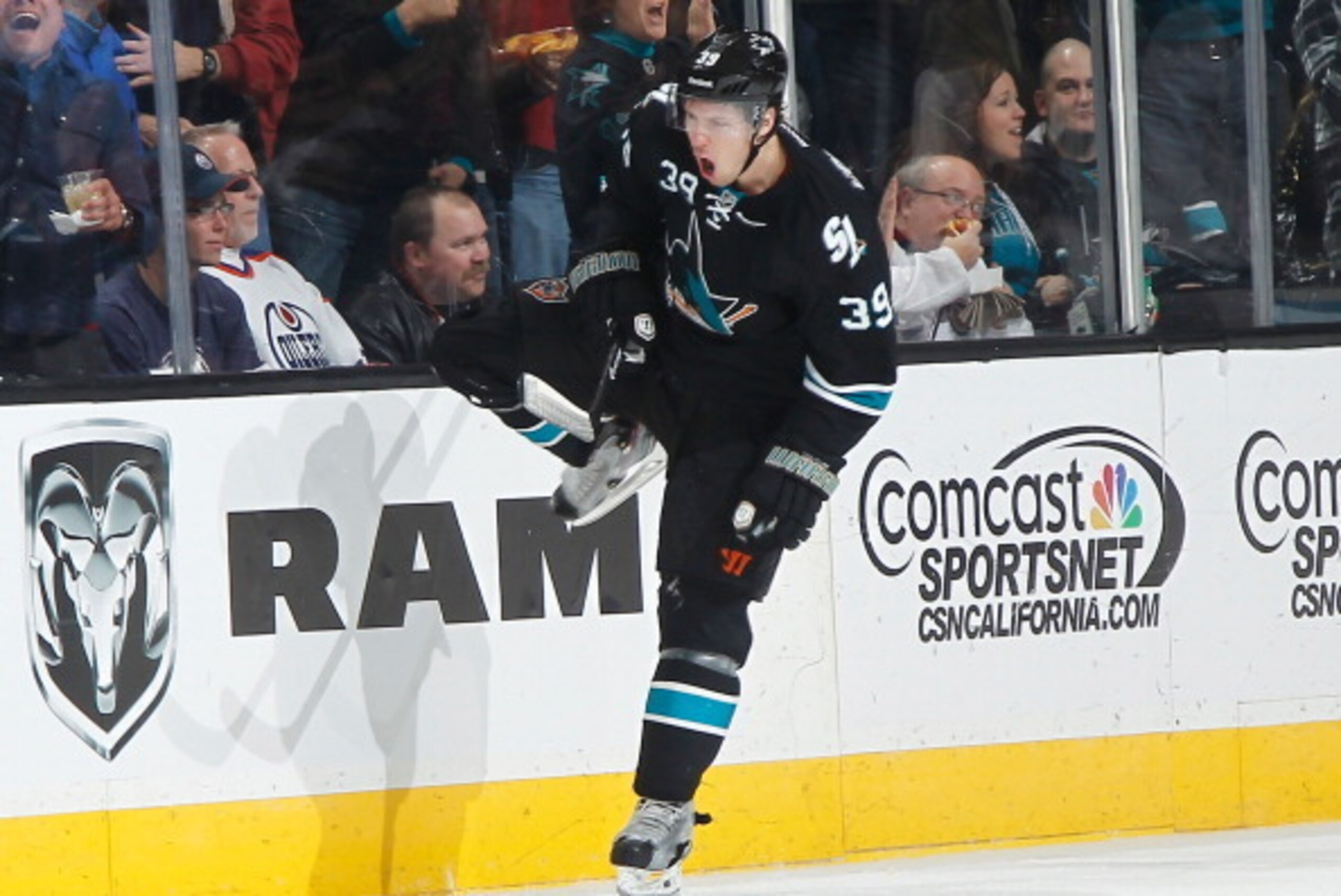 SAN JOSE, CA - JANUARY 2: Logan Couture #39 of the San Jose Sharks celebrates after his goal against the Edmonton Oilers during an NHL game on January 2, 2014 at SAP Center in San Jose, California. (Photo by Nick Lust/NHLI via Getty Images)