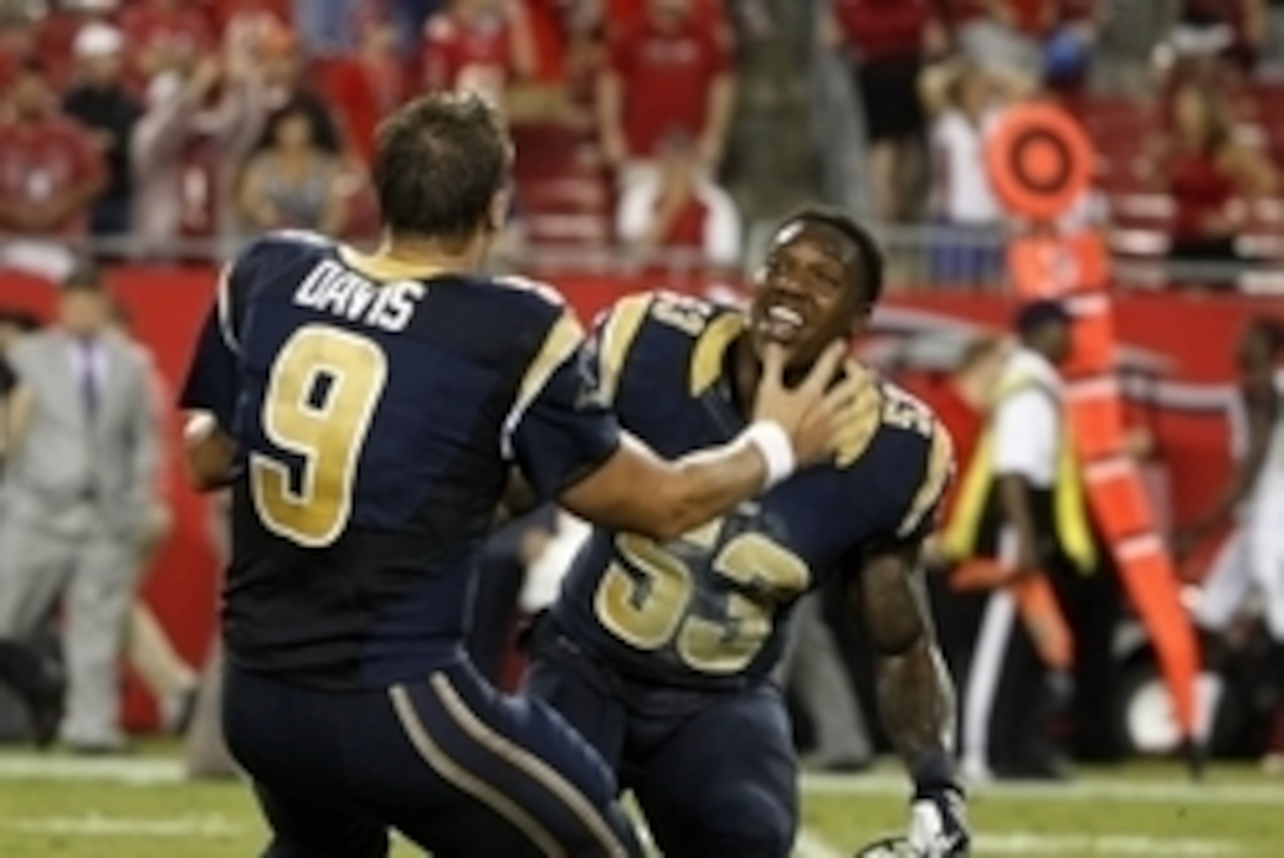 Sep 14, 2014; Tampa, FL, USA; St. Louis Rams quarterback Austin Davis (9) and linebacker Daren Bates (53) celebrate as time expires in the game against the Tampa Bay Buccaneers at Raymond James Stadium. St. Louis Rams defeated the Tampa Bay Buccaneers 19- Sep 14, 2014; Tampa, FL, USA; St. Louis Rams quarterback Austin Davis (9) and linebacker Daren Bates (53) celebrate as time expires in the game against the Tampa Bay Buccaneers at Raymond James Stadium. St. Louis Rams defeated the Tampa Bay Buccaneers 19-