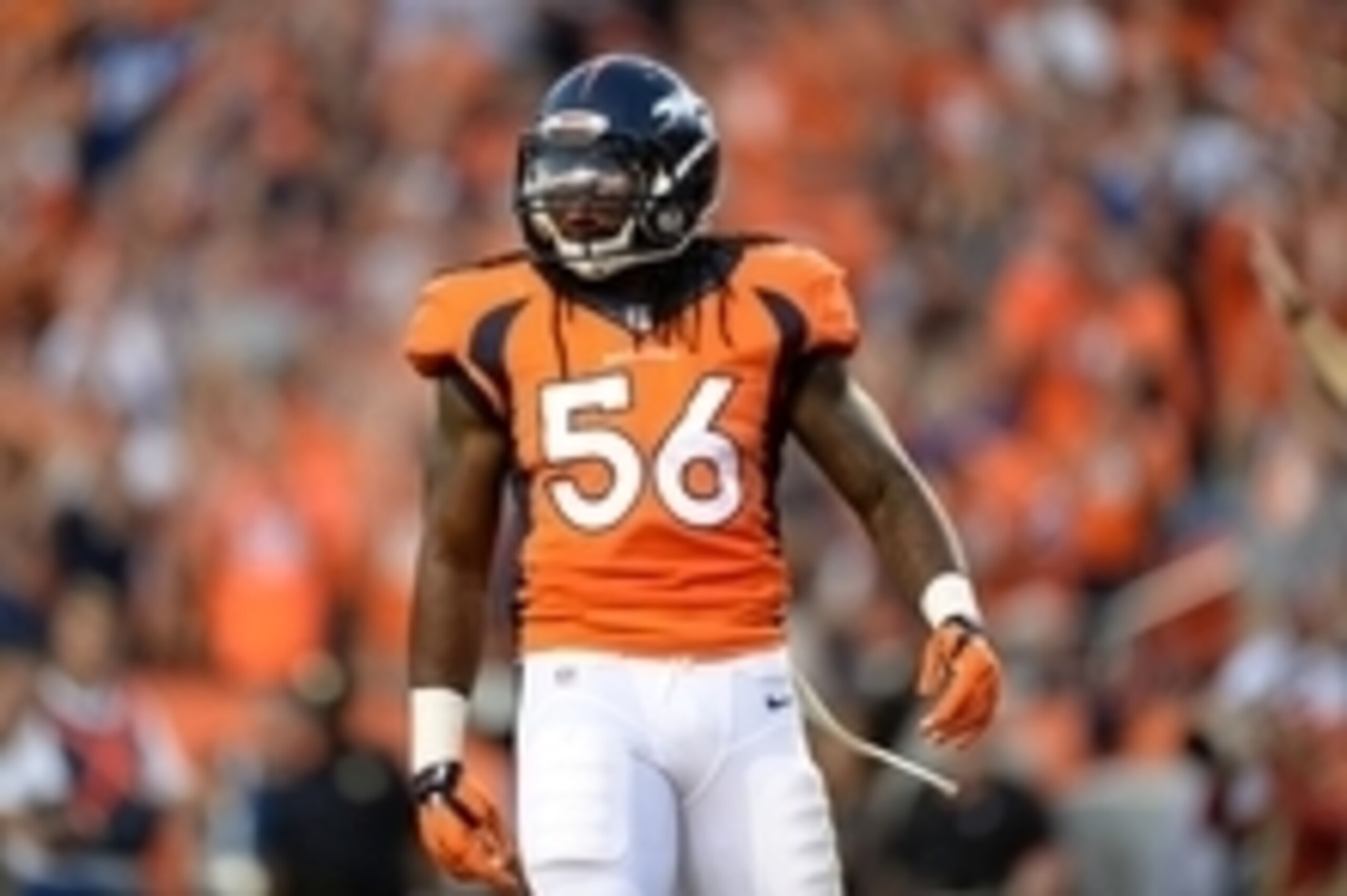 Sep 7, 2014; Denver, CO, USA; Denver Broncos outside linebacker Nate Irving (56) reacts after his sack in the second quarter against the Indianapolis Colts at Sports Authority Field at Mile High. Mandatory Credit: Ron Chenoy-USA TODAY Sports