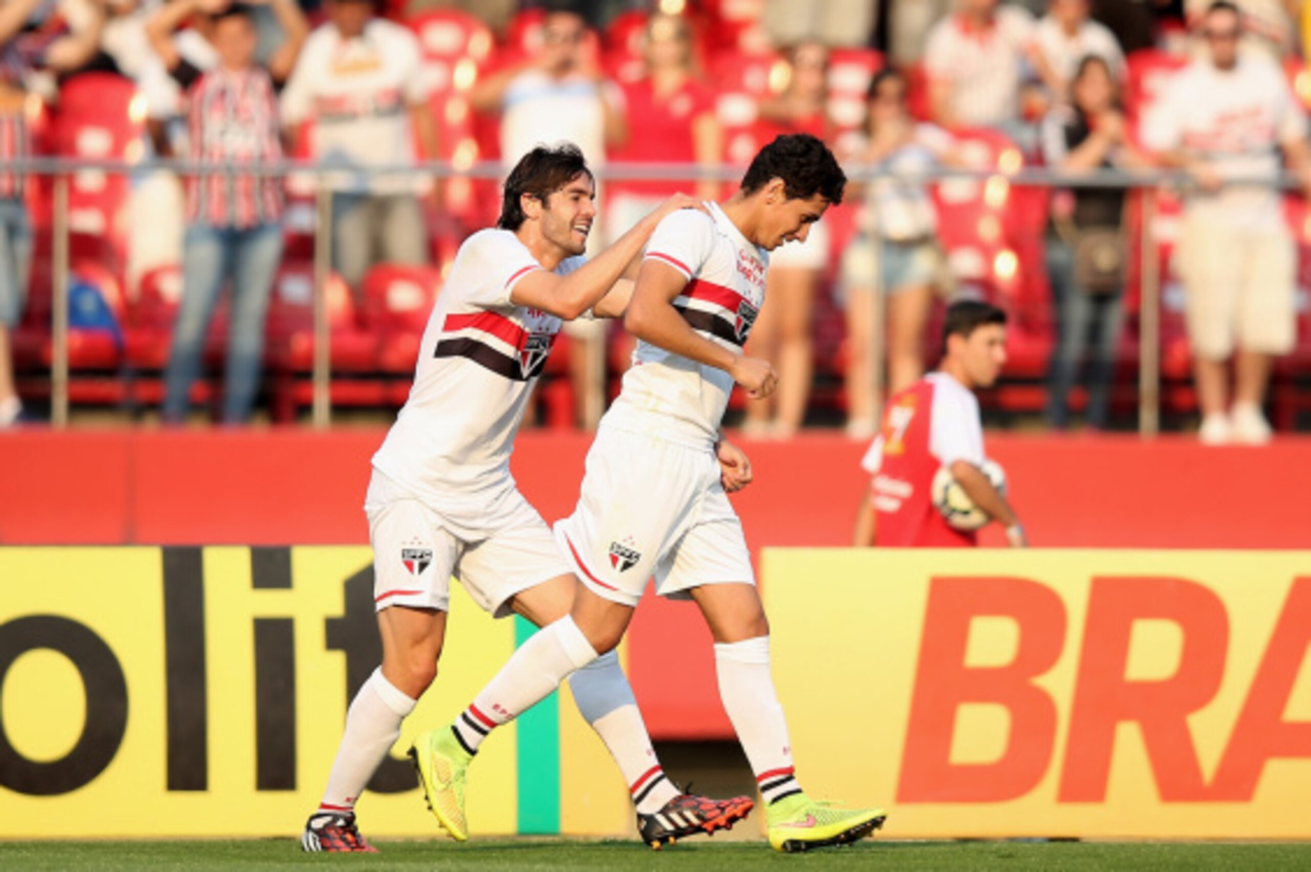 SAO PAULO, BRAZIL - AUGUST 24: Paulo Henrique Ganso (R) of Sao Paulo celebrates scoring the first goal with Kaka during the match between Sao Paulo and Santos for the Brazilian Series A 2014 at Estadio do Morumbi on August 24, 2014 in Sao Paulo, Brazil. (