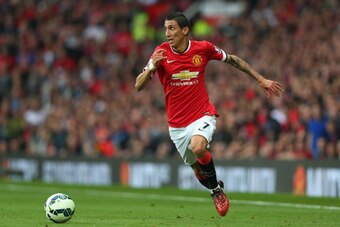MANCHESTER, ENGLAND - SEPTEMBER 14:  Angel Di Maria of Manchester United in action during the Barclays Premier League match between Manchester United and Queens Park Rangers at Old Trafford on September 14, 2014 in Manchester, England.  (Photo by Alex Liv