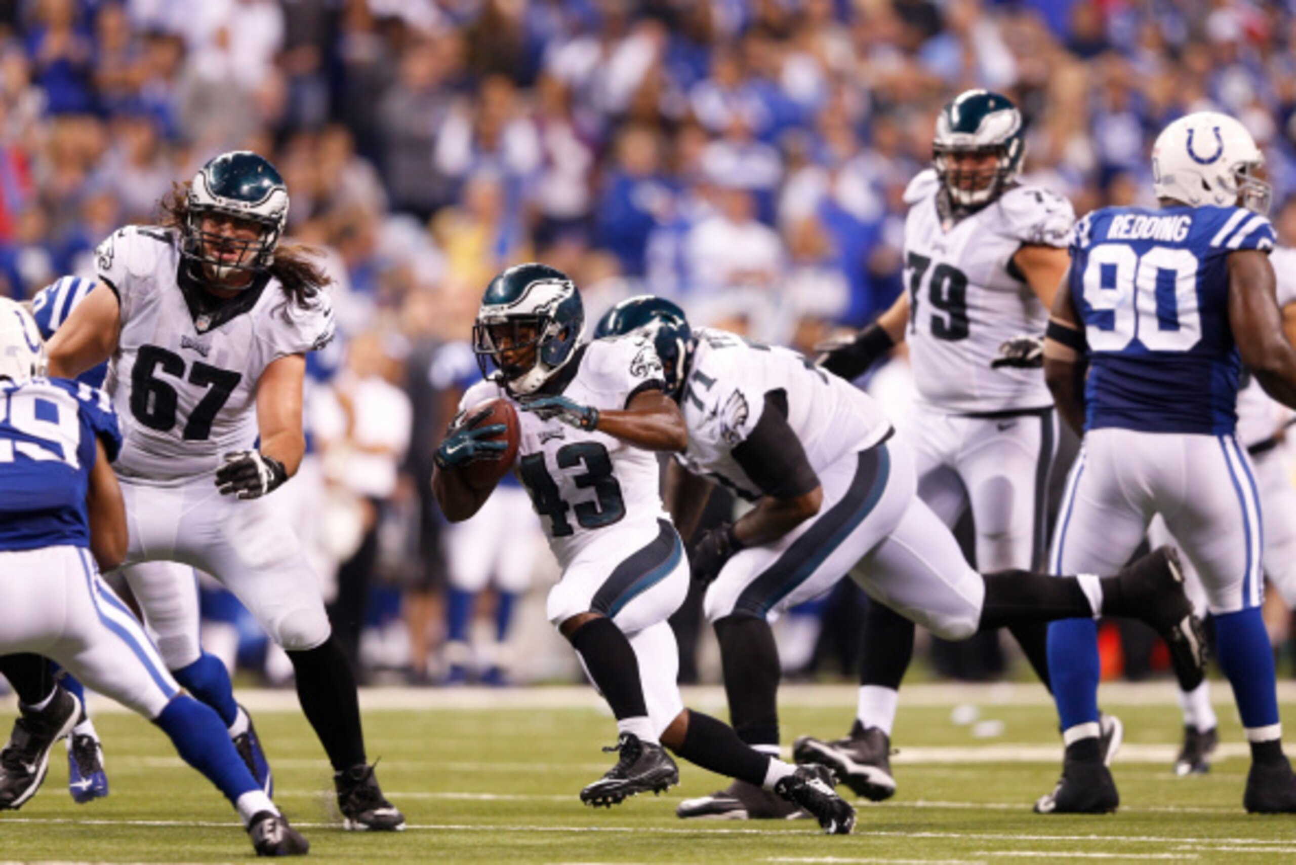 INDIANAPOLIS, IN - SEPTEMBER 15: Darren Sproles #43 of the Philadelphia Eagles runs downfield for a 51-yard gain on a reception in the fourth quarter of the game against the Indianapolis Colts at Lucas Oil Stadium on September 15, 2014 in Indianapolis, In