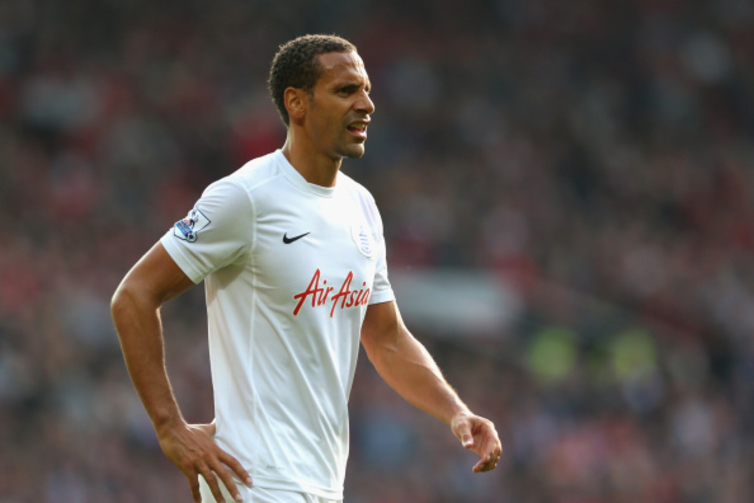 MANCHESTER, ENGLAND - SEPTEMBER 14:  Rio Ferdinand of QPR looks on during the Barclays Premier League match between Manchester United and Queens Park Rangers at Old Trafford on September 14, 2014 in Manchester, England.  (Photo by Alex Livesey/Getty Image