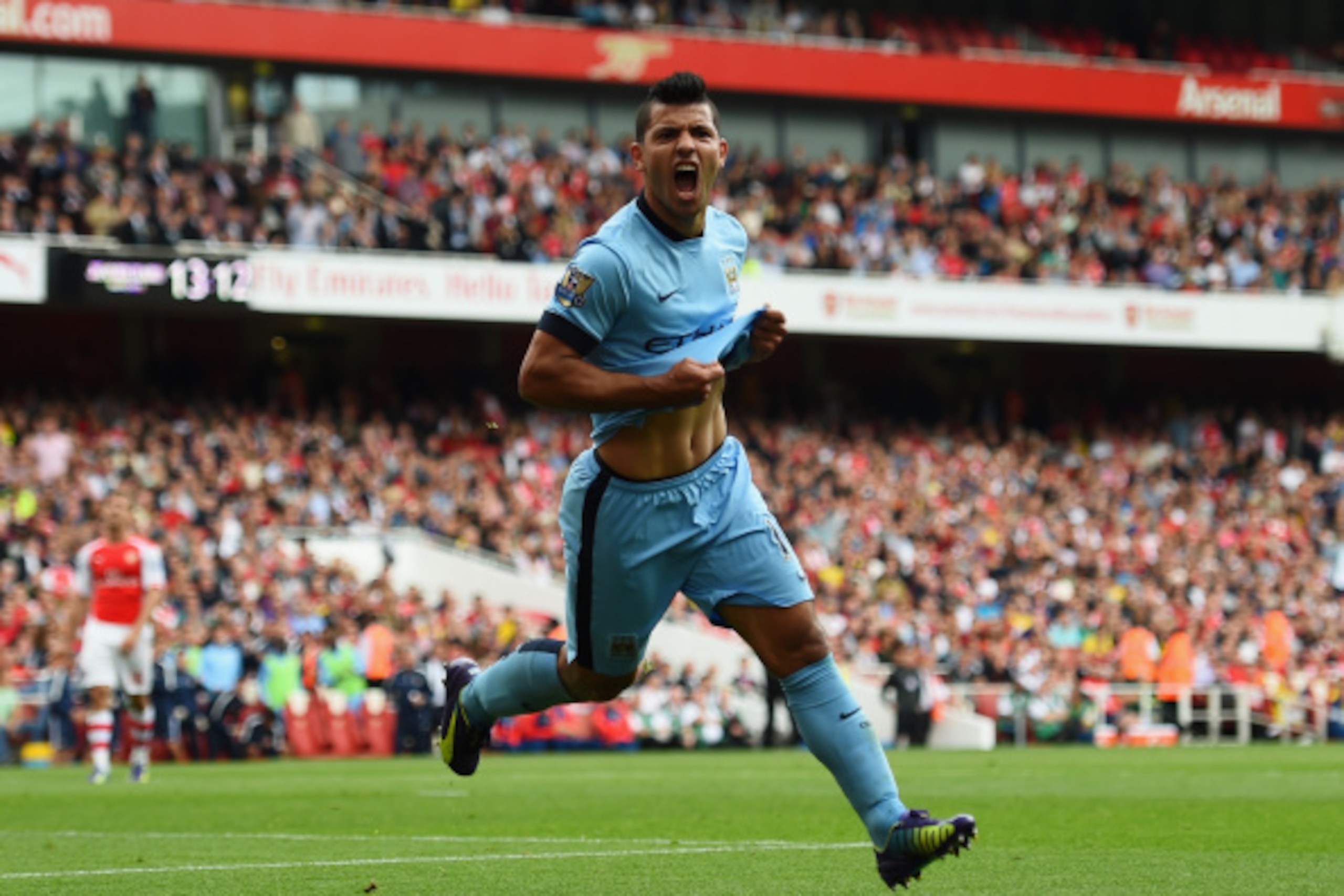 LONDON, ENGLAND - SEPTEMBER 13:  Sergio Aguero of Manchester City celebrates scoring the opening goal during the Barclays Premier League match between Arsenal and Manchester City at Emirates Stadium on September 13, 2014 in London, England.  (Photo by Sha