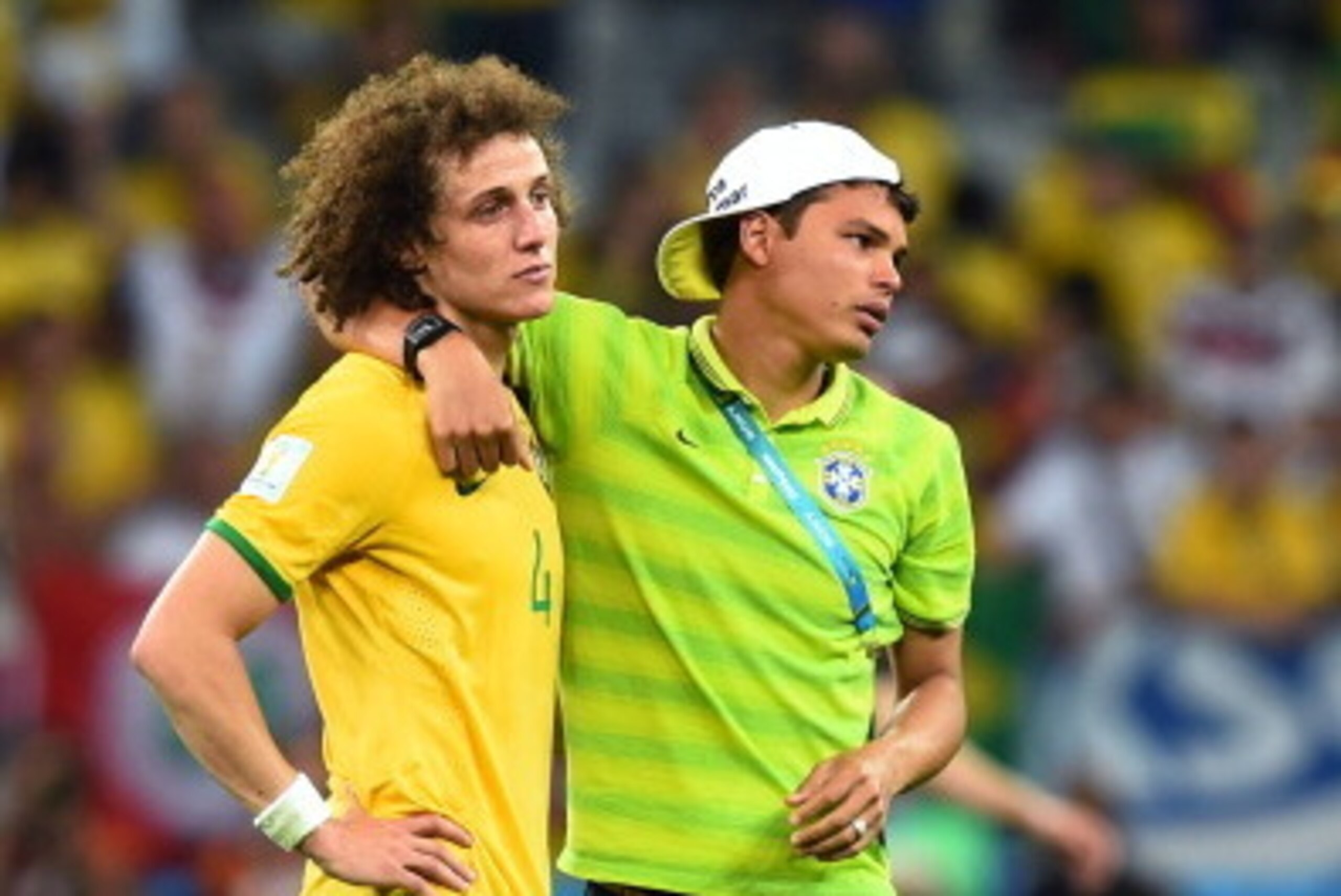 BELO HORIZONTE, BRAZIL - JULY 08:  Thiago Silva of Brazil consoles David Luiz after Germany's 7-1 victory during the 2014 FIFA World Cup Brazil Semi Final match between Brazil and Germany at Estadio Mineirao on July 8, 2014 in Belo Horizonte, Brazil.  (Ph