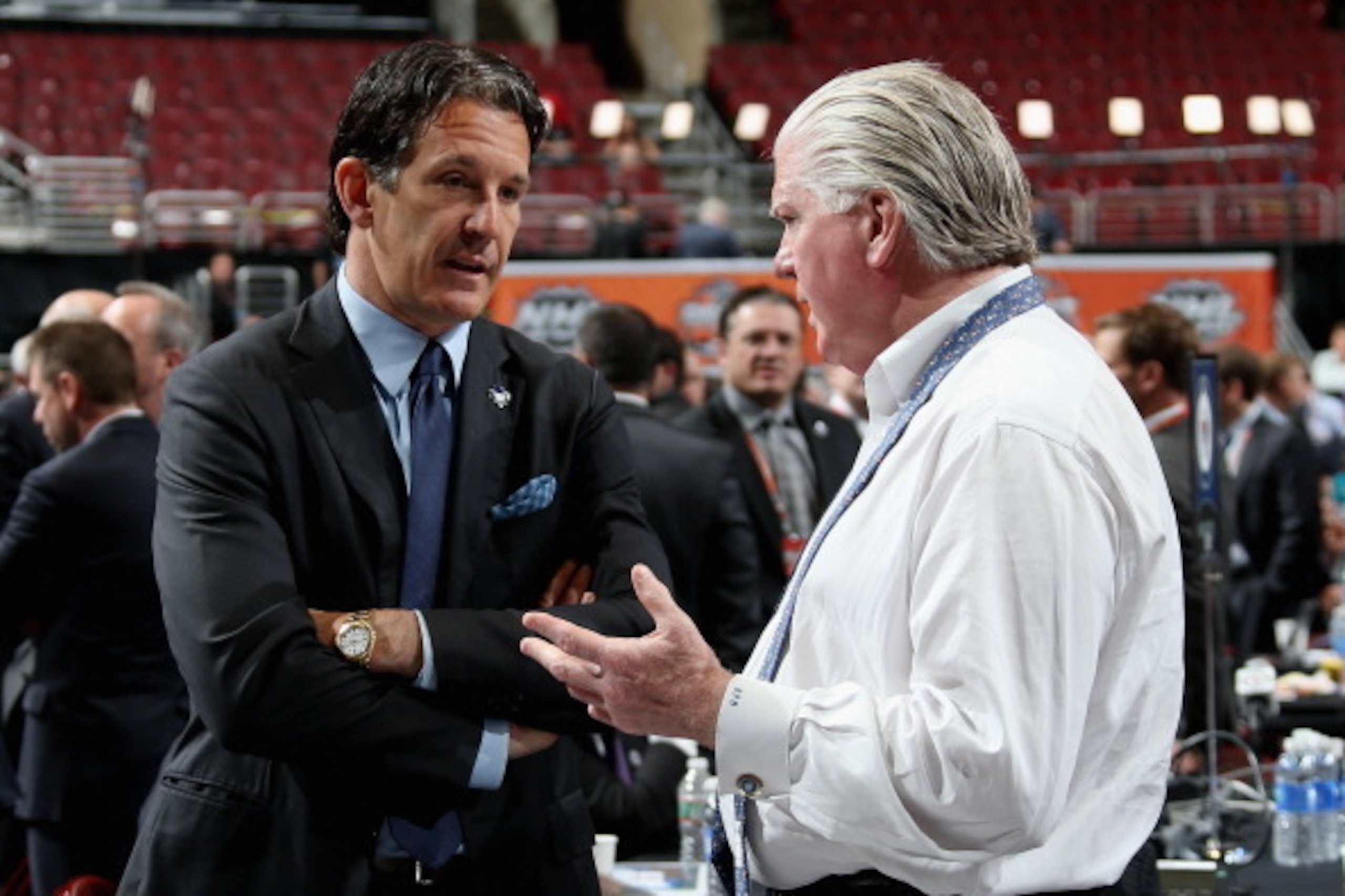PHILADELPHIA, PA - JUNE 28:  (L-R) Brendan Shanahan and Brian Burke of the Toronto Maple Leafs talk on Day Two of the 2014 NHL Draft at the Wells Fargo Center on June 28, 2014 in Philadelphia, Pennsylvania.  (Photo by Bruce Bennett/Getty Images)