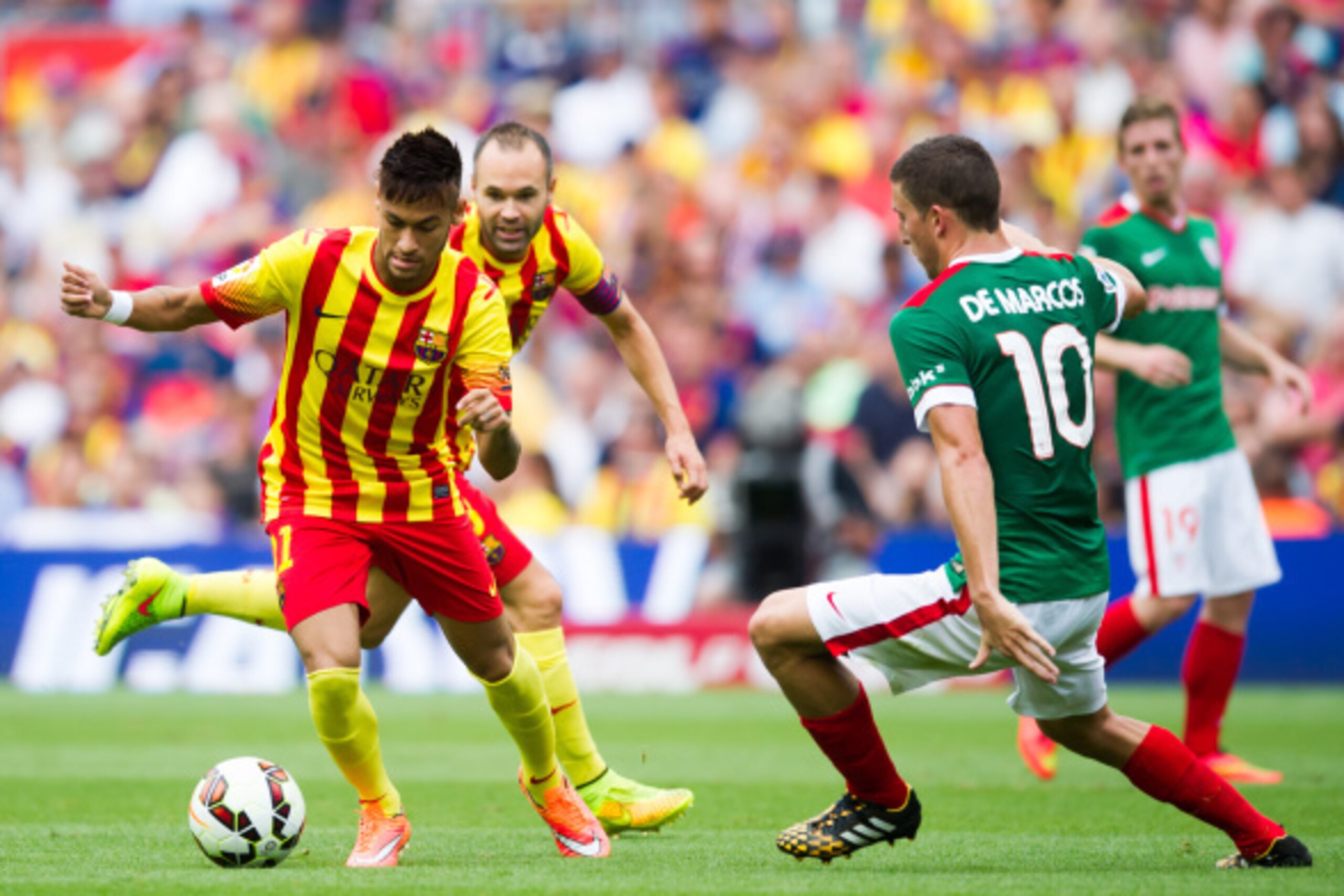 BARCELONA, SPAIN - SEPTEMBER 13: Neymar Santos Jr (L) of FC Barcelona competes for the ball with Oscar de Marcos of Athletic Club during the La Liga match between FC Barcelona and Athletic Club at Camp Nou on September 13, 2014 in Barcelona, Spain. (Photo BARCELONA, SPAIN - SEPTEMBER 13: Neymar Santos Jr (L) of FC Barcelona competes for the ball with Oscar de Marcos of Athletic Club during the La Liga match between FC Barcelona and Athletic Club at Camp Nou on September 13, 2014 in Barcelona, Spain. (Photo