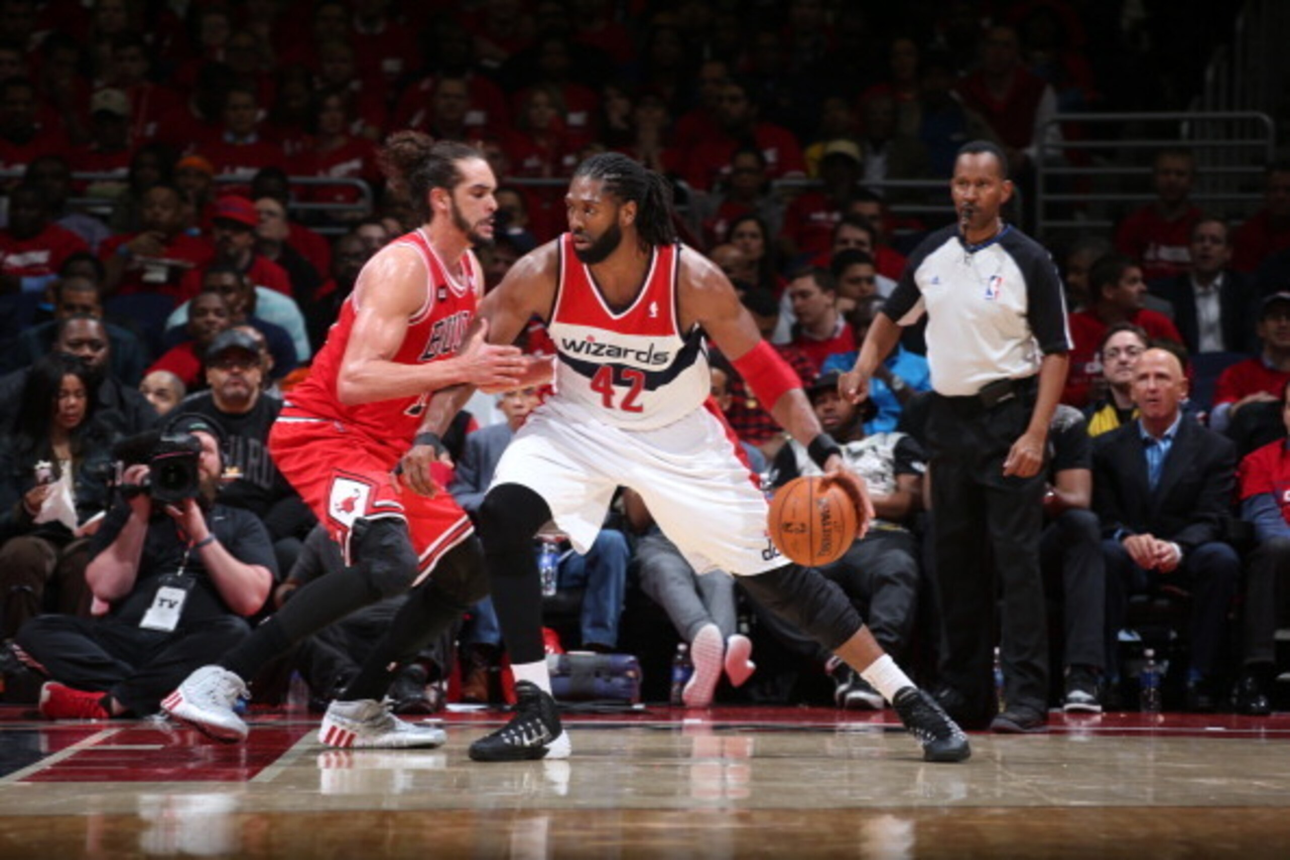 WASHINGTON, DC - APRIL 25: Nene Hilario #42 of the Washington Wizards posts up in Game Three of the Eastern Conference Quarterfinals during the 2014 NBA Playoffs against Joakim Noah #13 of the Chicago Bulls at the Verizon Center on April 25, 2014 in Washi