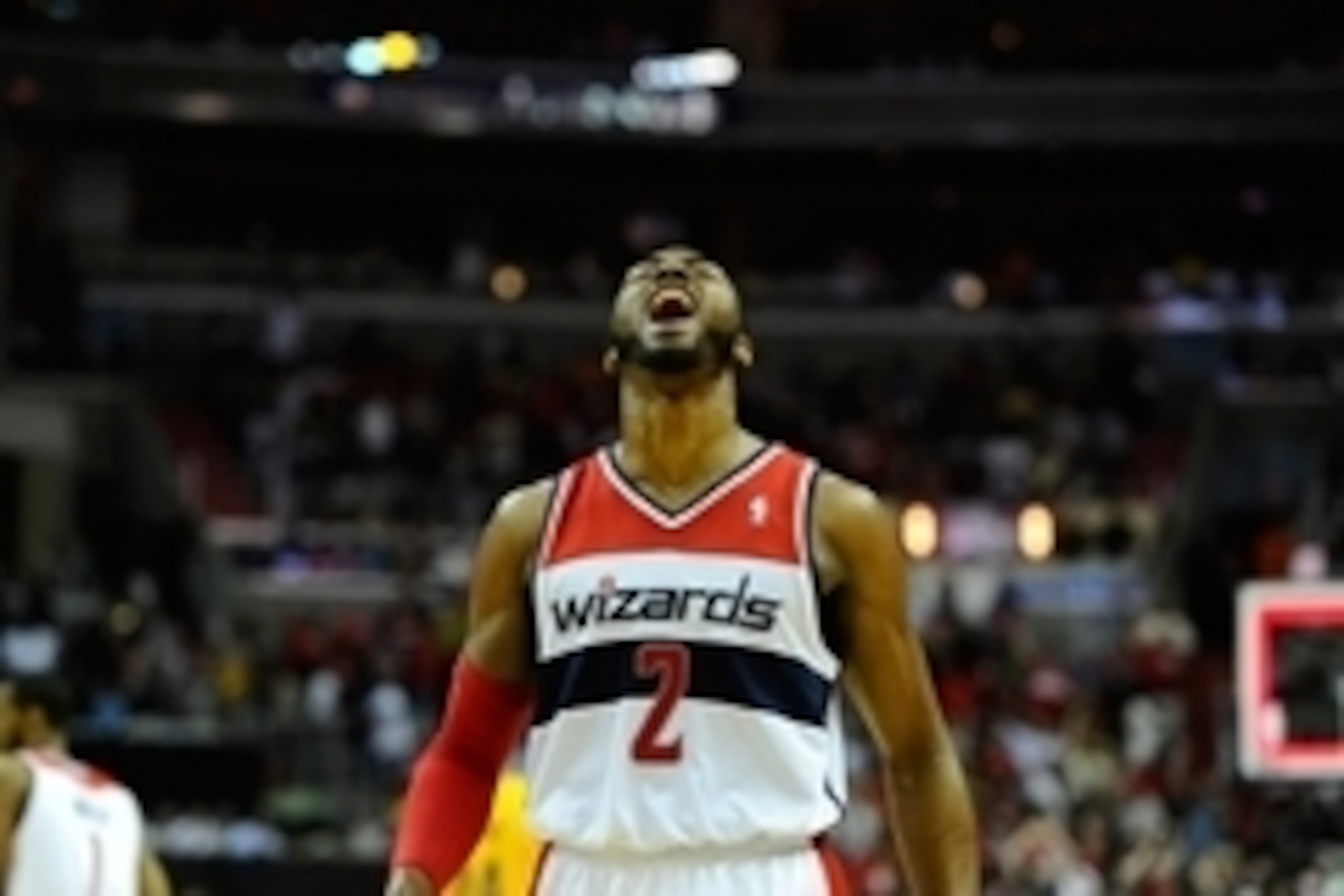 May 11, 2014; Washington, DC, USA; Washington Wizards point guard John Wall (2) celebrates after scoring a basket against the Indiana Pacers during the first half in game four of the second round of the 2014 NBA Playoffs at Verizon Center. Mandatory Credi