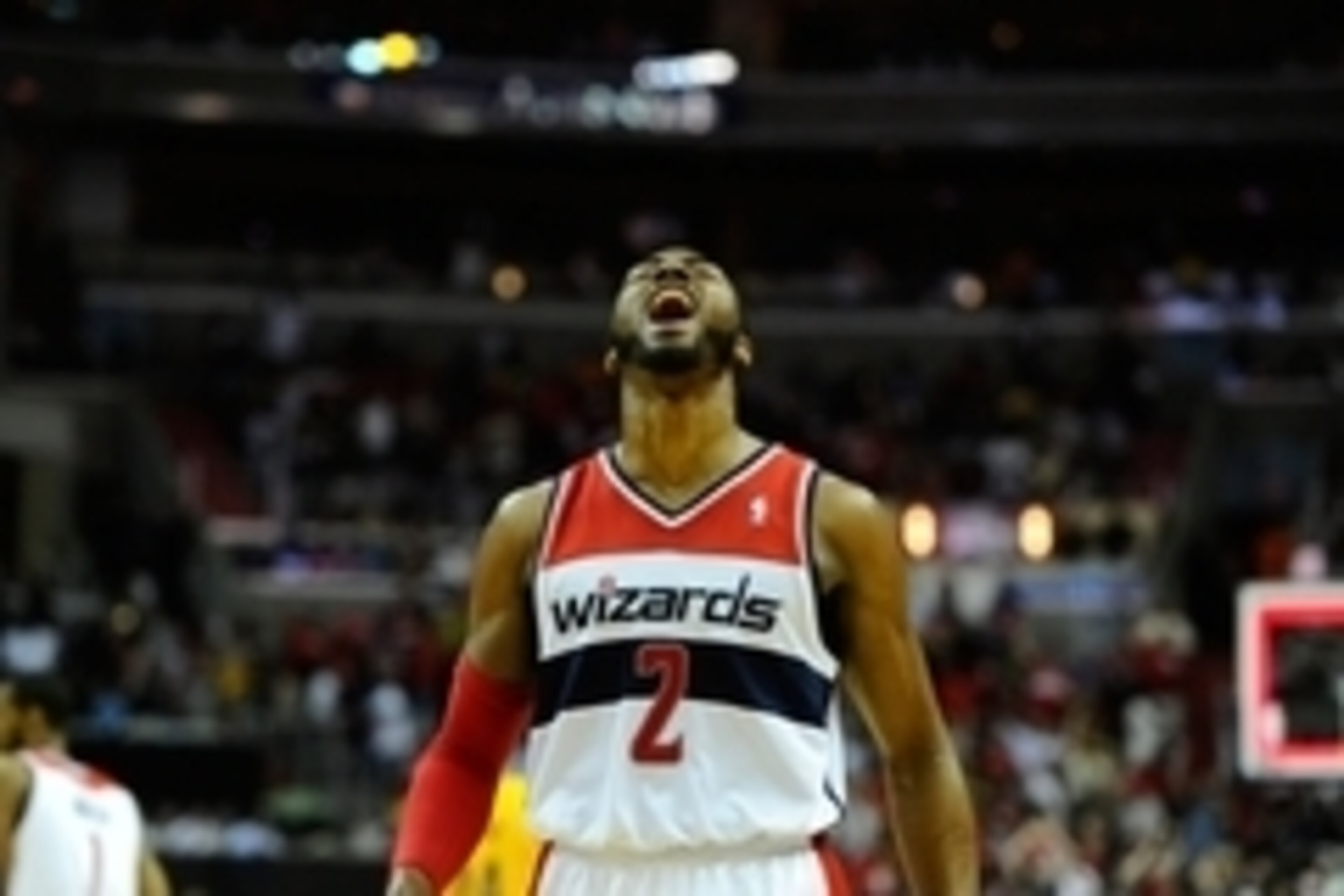 May 11, 2014; Washington, DC, USA; Washington Wizards point guard John Wall (2) celebrates after scoring a basket against the Indiana Pacers during the first half in game four of the second round of the 2014 NBA Playoffs at Verizon Center. Mandatory Credi
