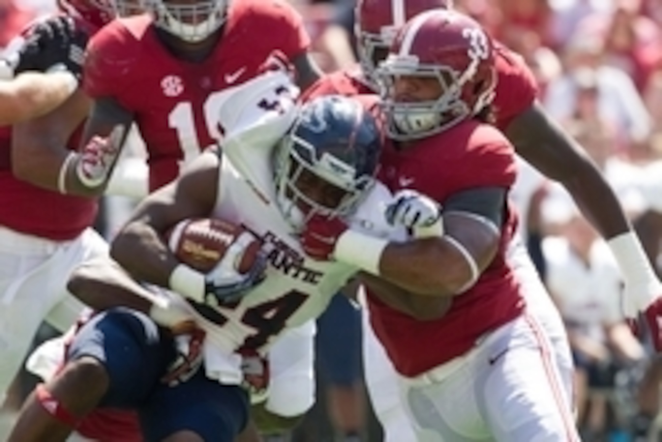 Sep 6, 2014; Tuscaloosa, AL, USA; Alabama Crimson Tide linebacker Trey DePriest (33) and defensive back Geno Smith (24) tackle Florida Atlantic Owls running back Tony Moore (24) at Bryant-Denny Stadium. Mandatory Credit: Marvin Gentry-USA TODAY Sports Sep 6, 2014; Tuscaloosa, AL, USA; Alabama Crimson Tide linebacker Trey DePriest (33) and defensive back Geno Smith (24) tackle Florida Atlantic Owls running back Tony Moore (24) at Bryant-Denny Stadium. Mandatory Credit: Marvin Gentry-USA TODAY Sports