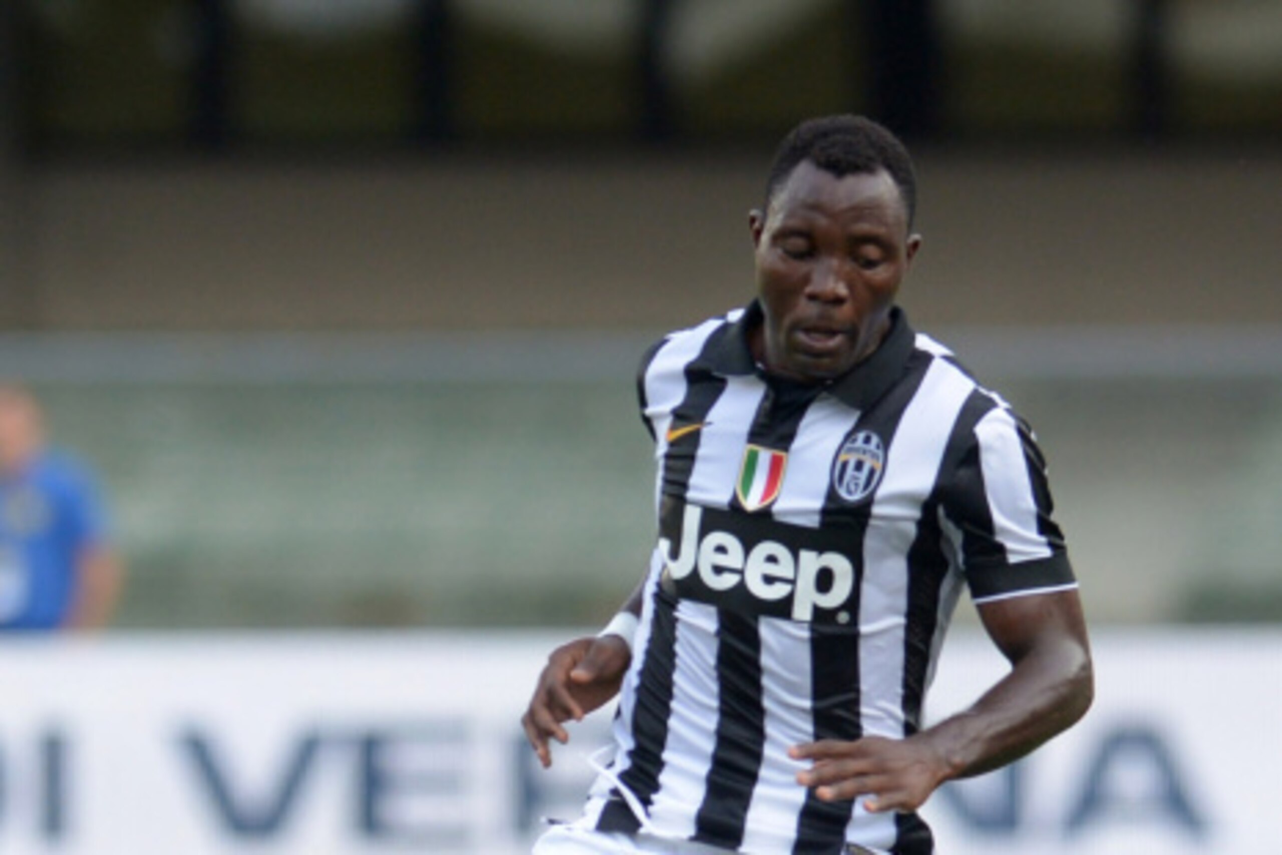 VERONA, ITALY - AUGUST 30:  Kwadwo Asamoah of Juventus in action during the Serie A match between AC Chievo Verona and Juventus FC at Stadio Marc'Antonio Bentegodi on August 30, 2014 in Verona, Italy.  (Photo by Dino Panato/Getty Images)