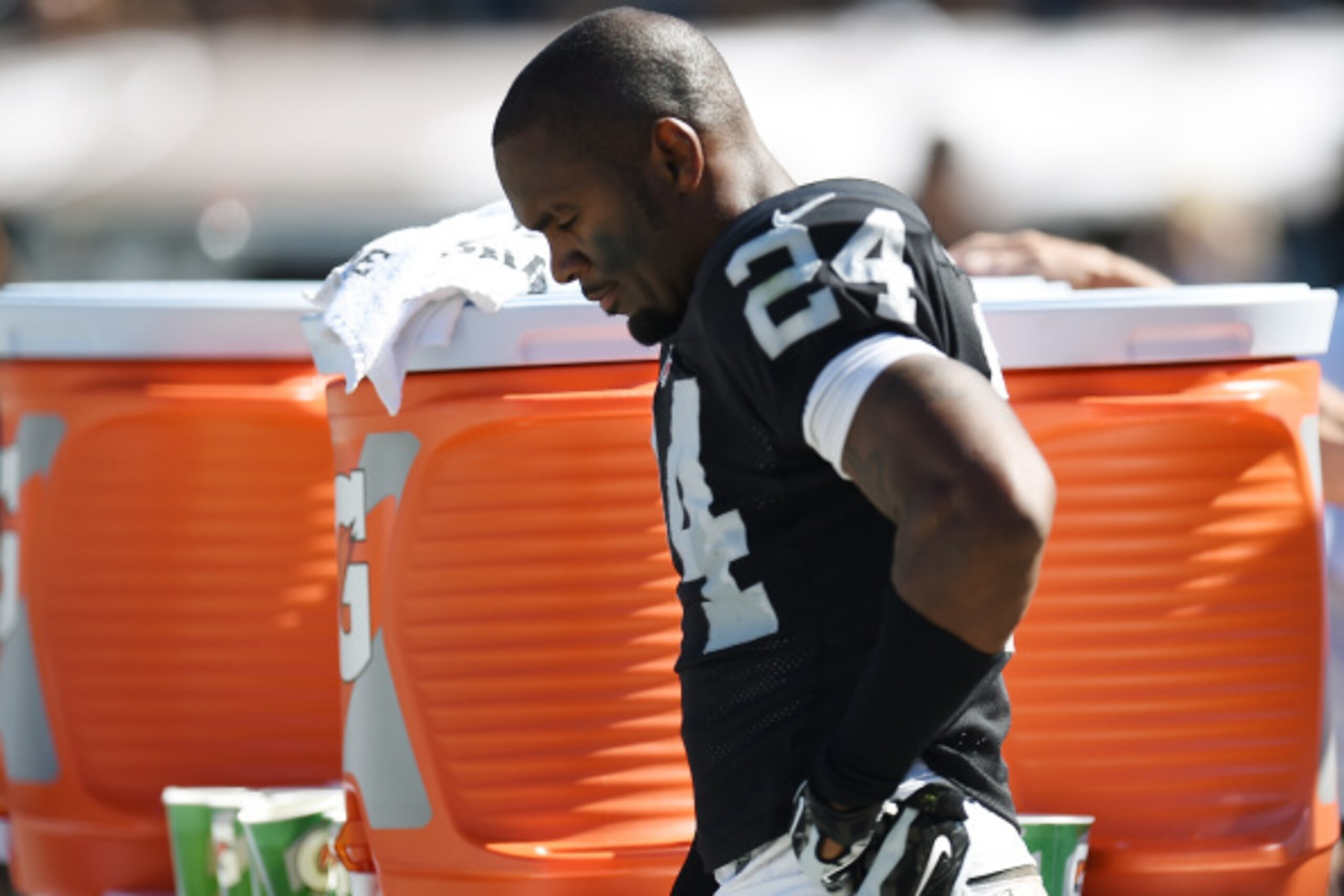 OAKLAND, CA - SEPTEMBER 14: Charles Woodson #24 of the Oakland Raiders leans against a cooler during the third quarter against the Houston Texans at O.co Coliseum on September 14, 2014 in Oakland, California. The Texans won the game 30-14. (Photo by Thea OAKLAND, CA - SEPTEMBER 14: Charles Woodson #24 of the Oakland Raiders leans against a cooler during the third quarter against the Houston Texans at O.co Coliseum on September 14, 2014 in Oakland, California. The Texans won the game 30-14. (Photo by Thea