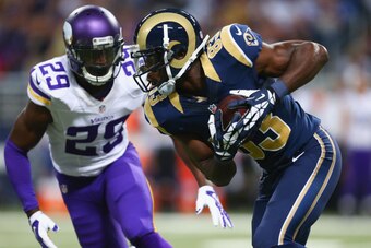 ST. LOUIS, MO - SEPTEMBER 7: Brian Quick #83 of the St. Louis Rams makes a catch against Xavier Rhodes #29 of the Minnesota Vikings at the Edward Jones Dome on September 7, 2014 in St. Louis, Missouri.  (Photo by Dilip Vishwanat/Getty Images)