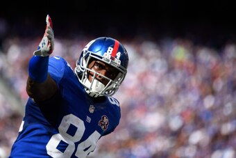 EAST RUTHERFORD, NJ - SEPTEMBER 14:  Tight end Larry Donnell #84 of the New York Giants celebrates against the Arizona Cardinals during a game at MetLife Stadium on September 14, 2014 in East Rutherford, New Jersey.  (Photo by Alex Goodlett/Getty Images)
