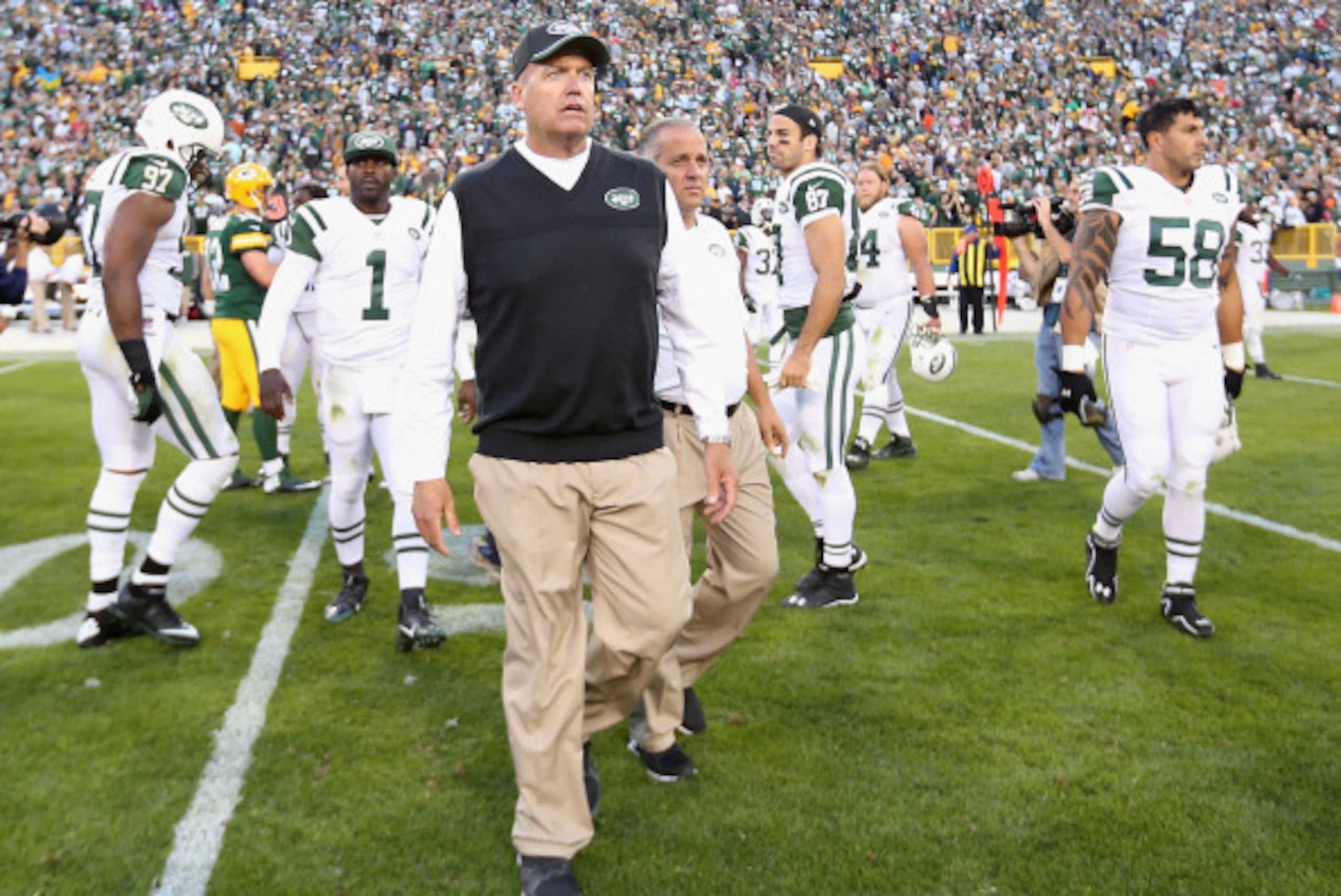 GREEN BAY, WI - SEPTEMBER 14: Head coach Rex Ryan of the New York Jets walks out to mid field following the NFL game against the Green Bay Packers at Lambeau Field on September 14, 2014 in Green Bay, Wisconsin. The Packers defeated the Jets 31-24. (Phot GREEN BAY, WI - SEPTEMBER 14: Head coach Rex Ryan of the New York Jets walks out to mid field following the NFL game against the Green Bay Packers at Lambeau Field on September 14, 2014 in Green Bay, Wisconsin. The Packers defeated the Jets 31-24. (Phot