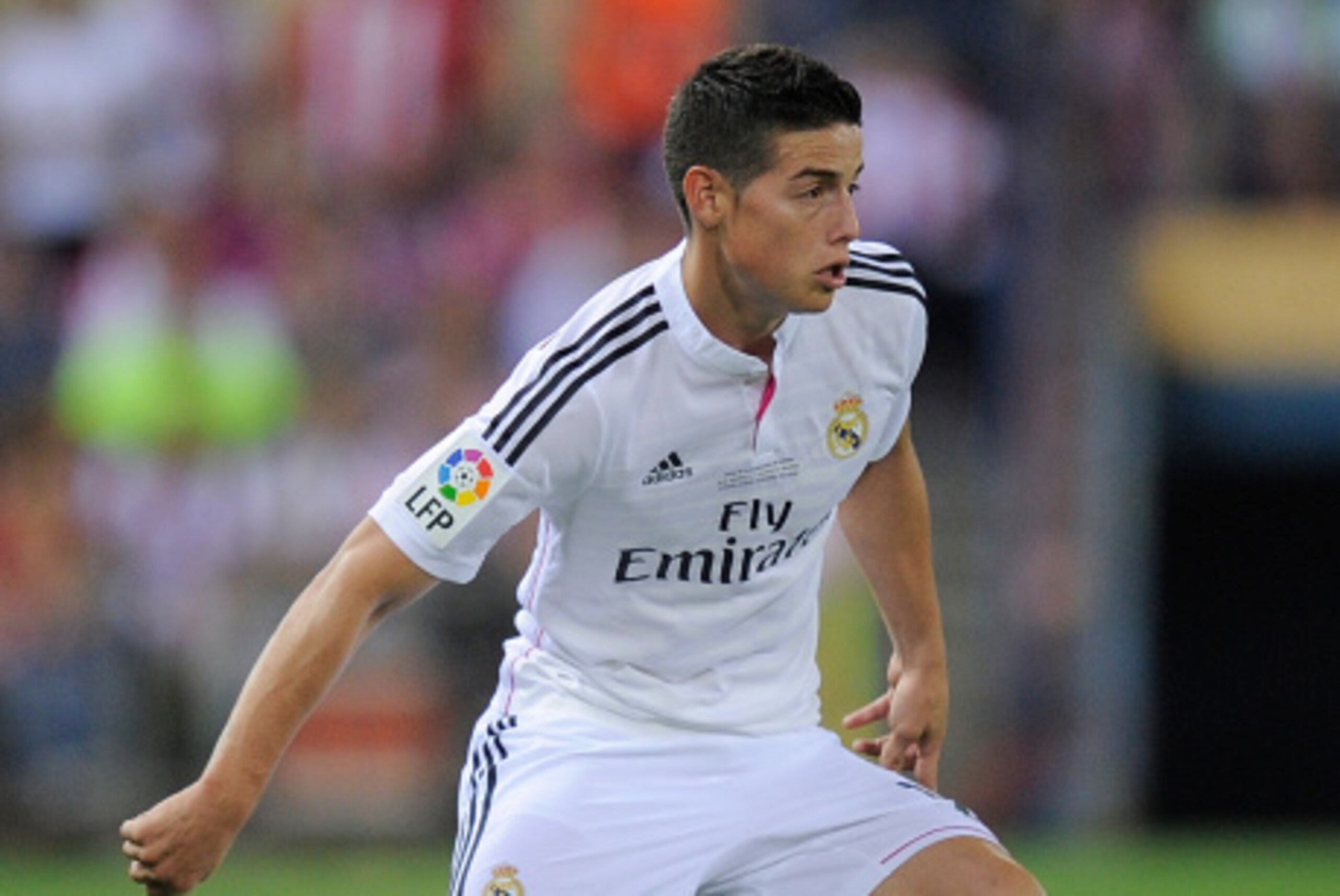 MADRID, SPAIN - AUGUST 22:  James Rodriguez of Real Madrid in action during the Supercopa, second leg match between Club Atletico de Madrid and Real Madrid at Vicente Caldron stadium on August 22, 2014 in Madrid, Spain.  (Photo by Denis Doyle/Getty Images