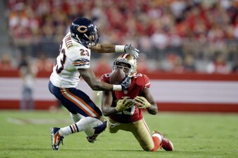 SANTA CLARA, CA - SEPTEMBER 14:  Cornerback Kyle Fuller #23 of the Chicago Bears intercepts a pass intended for wide receiver Michael Crabtree #15 of the San Francisco 49ers at Levi's Stadium on September 14, 2014 in Santa Clara, California.  (Photo by Ez