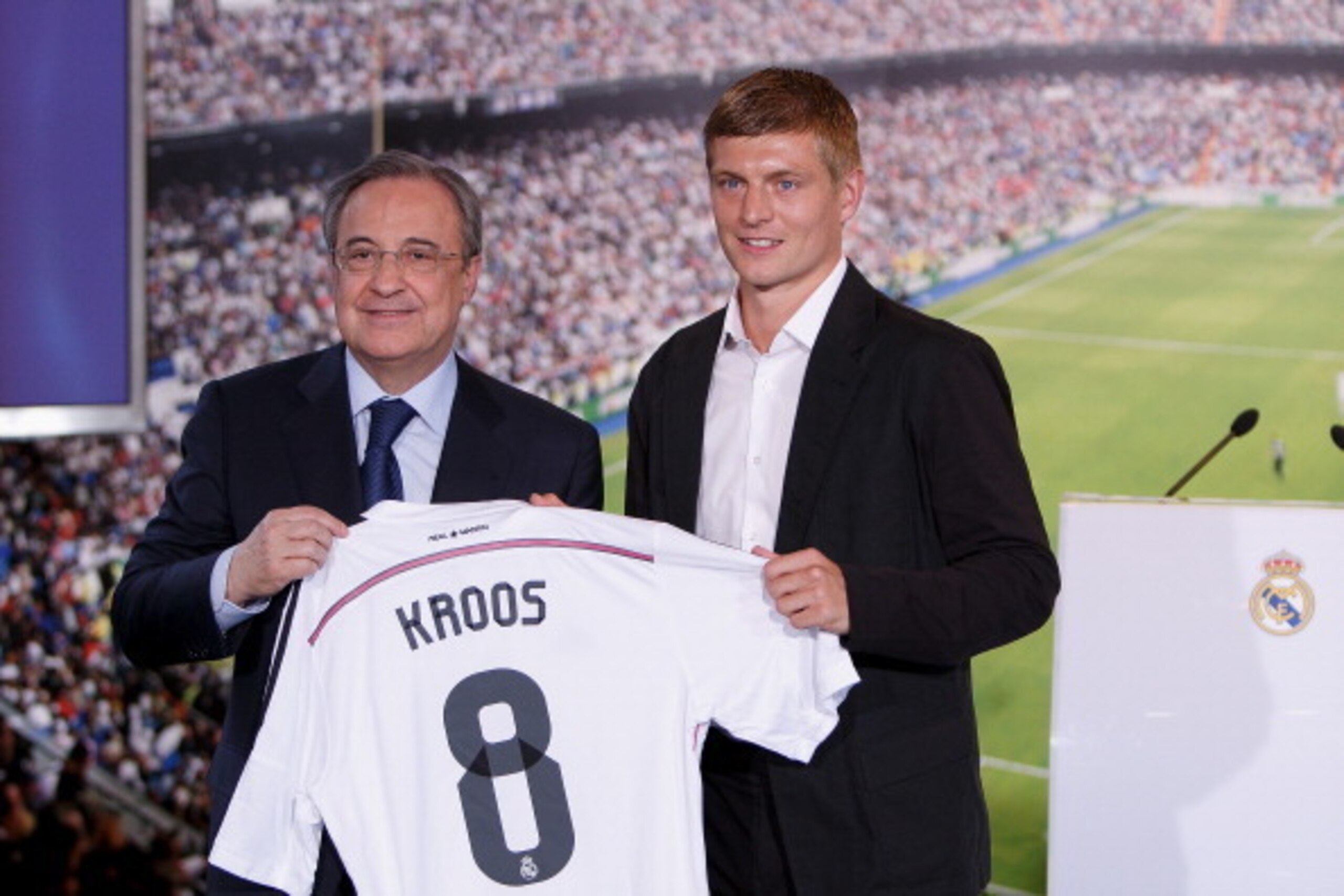 MADRID, SPAIN - JULY 17:  . L-R) President of Real Madrid Florentino Perez and Real Madrid player Toni Kroos pose with Kroos' new Real Madrid shirt during his official unveiling at Santiago Bernabeu Stadium on July 17, 2014 in Madrid, Spain. Toni Kroos wh