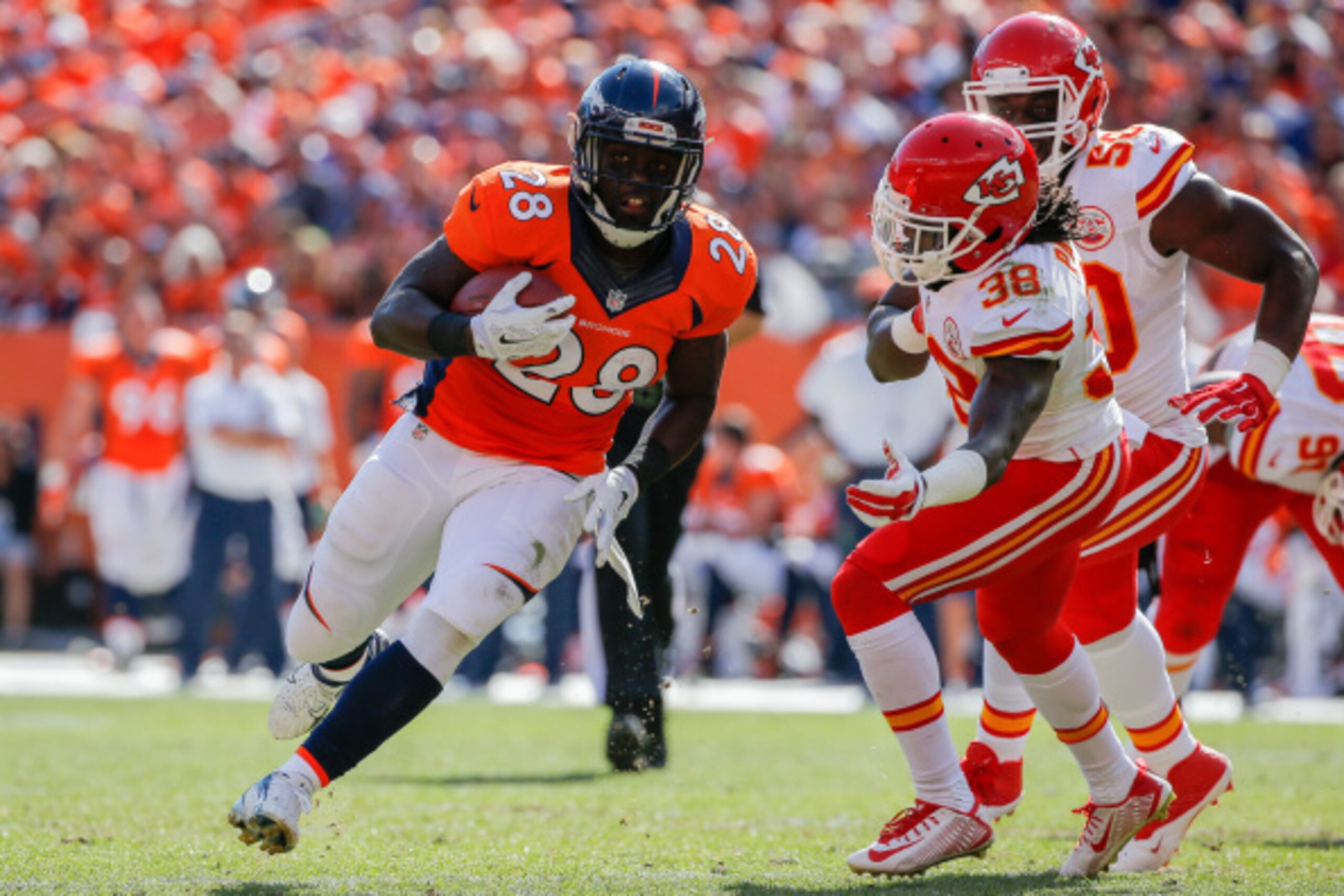 DENVER, CO - SEPTEMBER 14:  Running back Montee Ball #28 of the Denver Broncos rushes against the Kansas City Chiefs in the second quarter of a game at Sports Authority Field at Mile High on September 14, 2014 in Denver, Colorado.  (Photo by Doug Pensinge