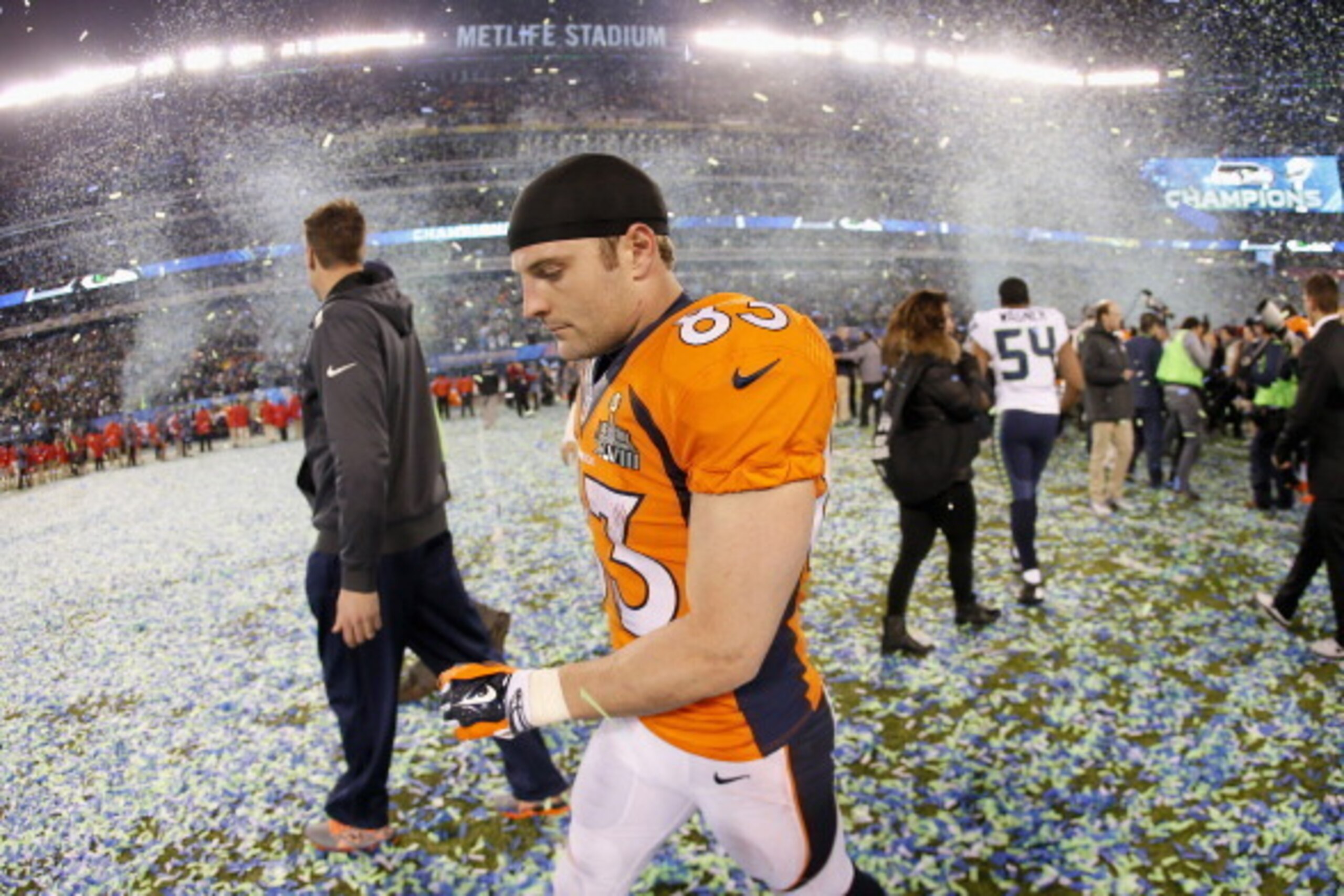 EAST RUTHERFORD, NJ - FEBRUARY 02:  Wide receiver Wes Welker #83 of the Denver Broncos walks off the field after their 43-8 loss to the Seattle Seahawks during Super Bowl XLVIII at MetLife Stadium on February 2, 2014 in East Rutherford, New Jersey.  (Phot